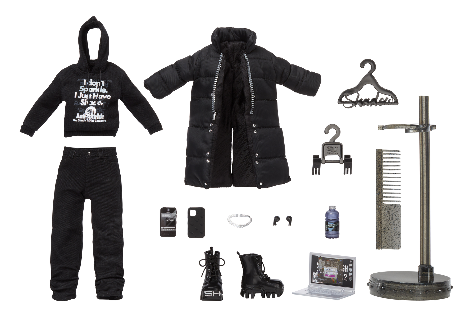 Akcesoria dla lalek, w tym płaszcz, dżinsy, buty i laptop.