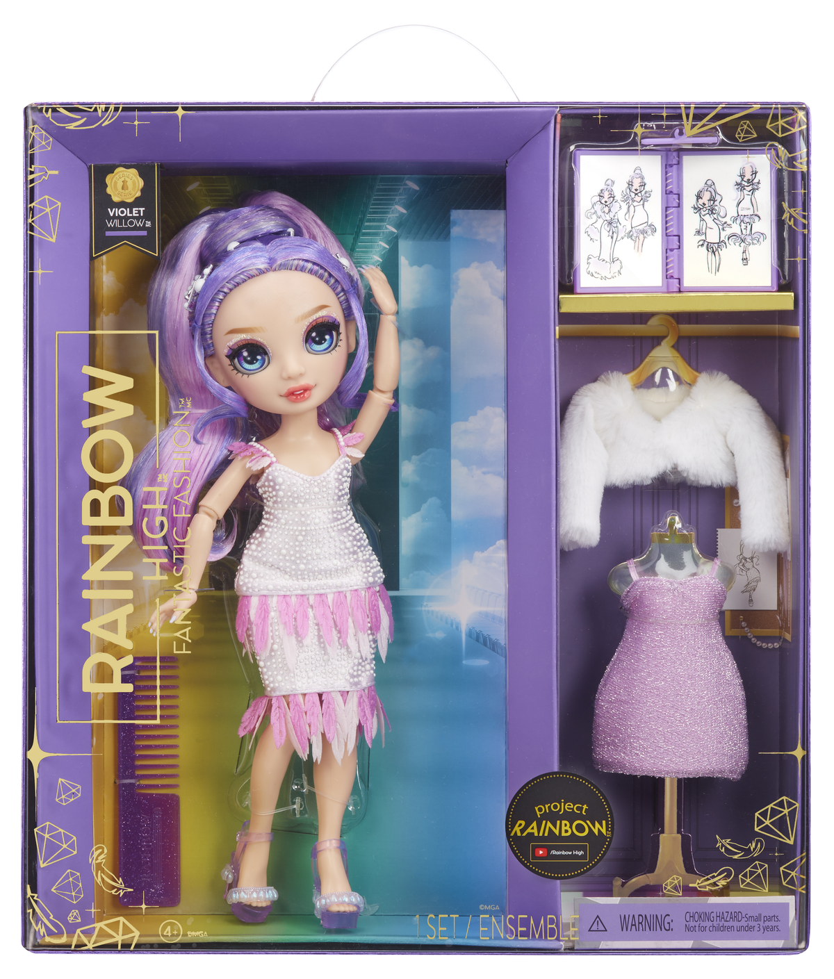 Lalka w pudełku, w białej górze i różowej spódnicy. Akcesoria również w pudełku.