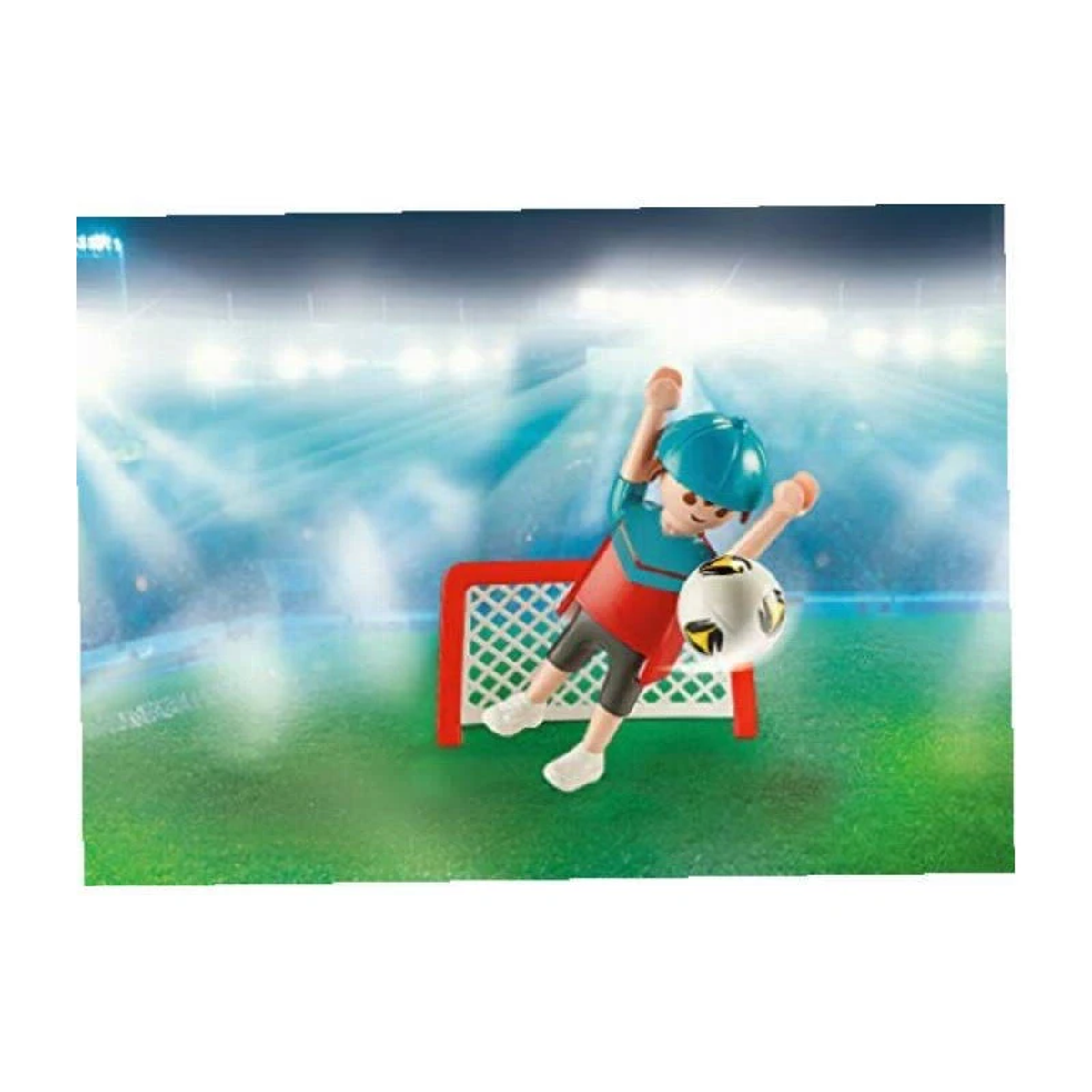 Personaggio Playmobil che calcia un pallone verso una porta. La scena è in uno stadio.