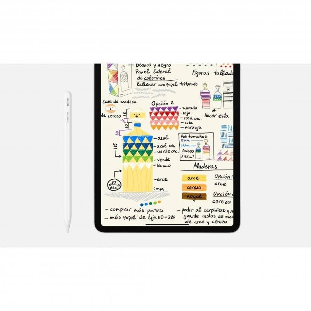 Tablet mit Stift an der Seite und Notizen mit Zeichnungen und Text auf Spanisch.