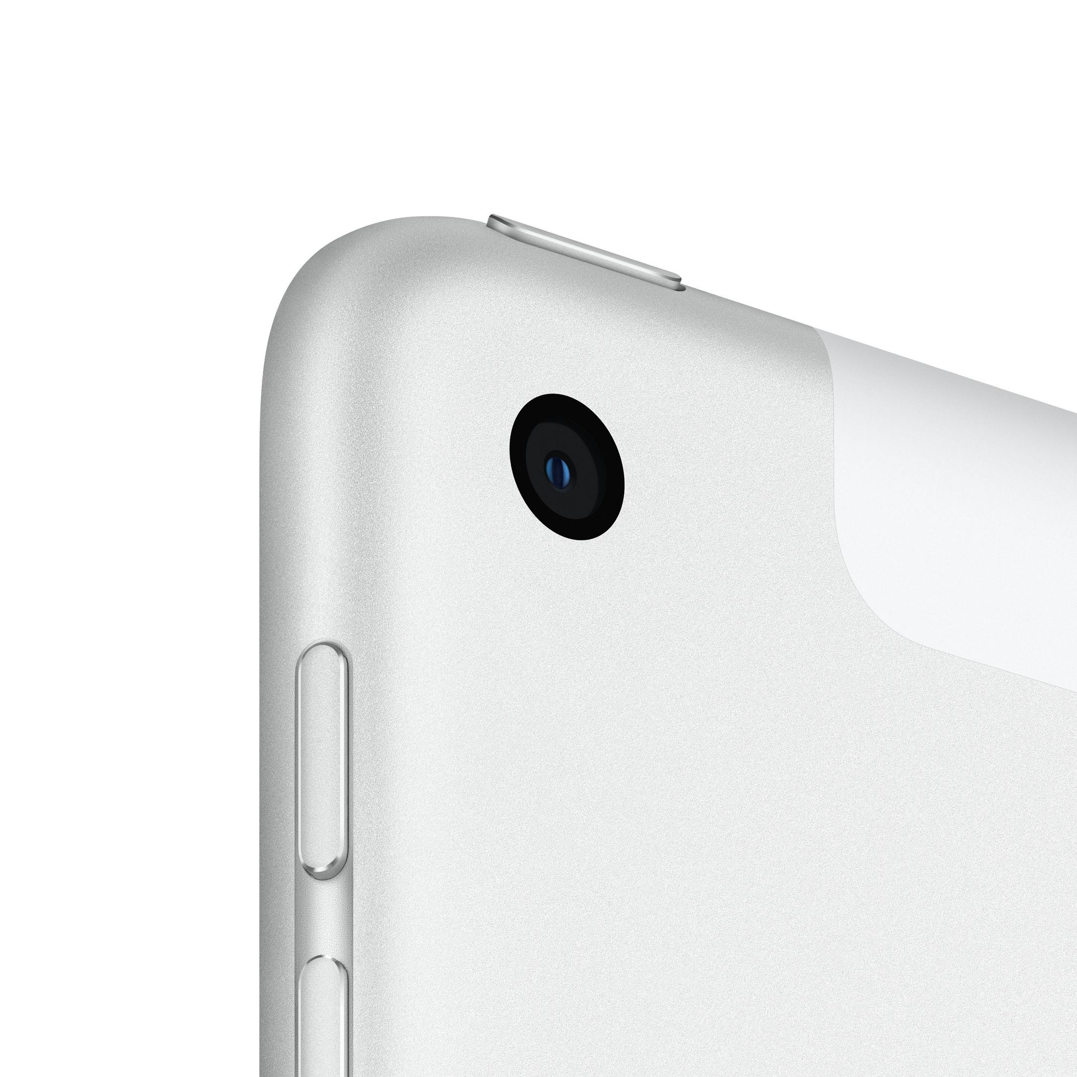 Close-up van witte iPad-hoek met cameralens en knop.
