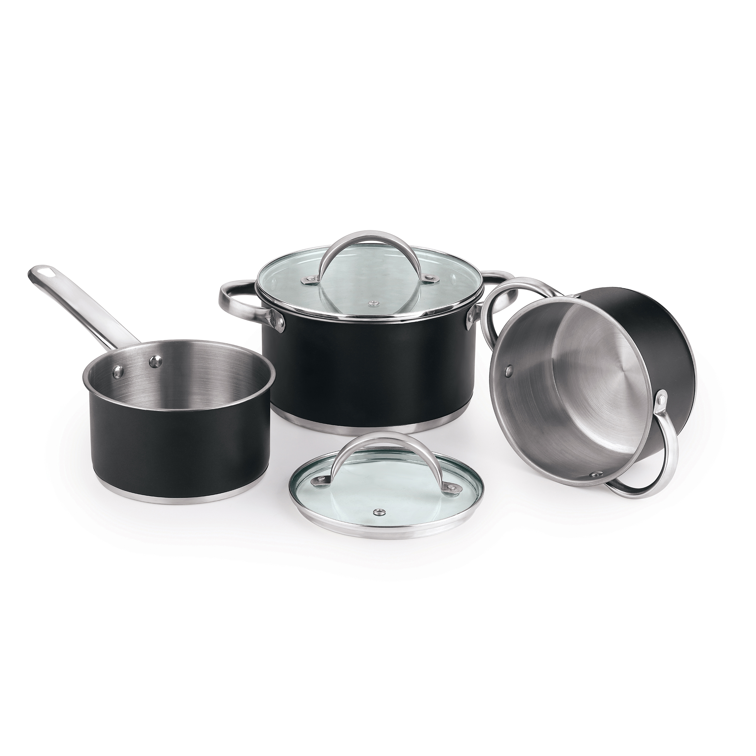 Un juego de ollas de cocina negras y plateadas con tapas de vidrio. El juego contiene tres ollas y un cazo pequeño.