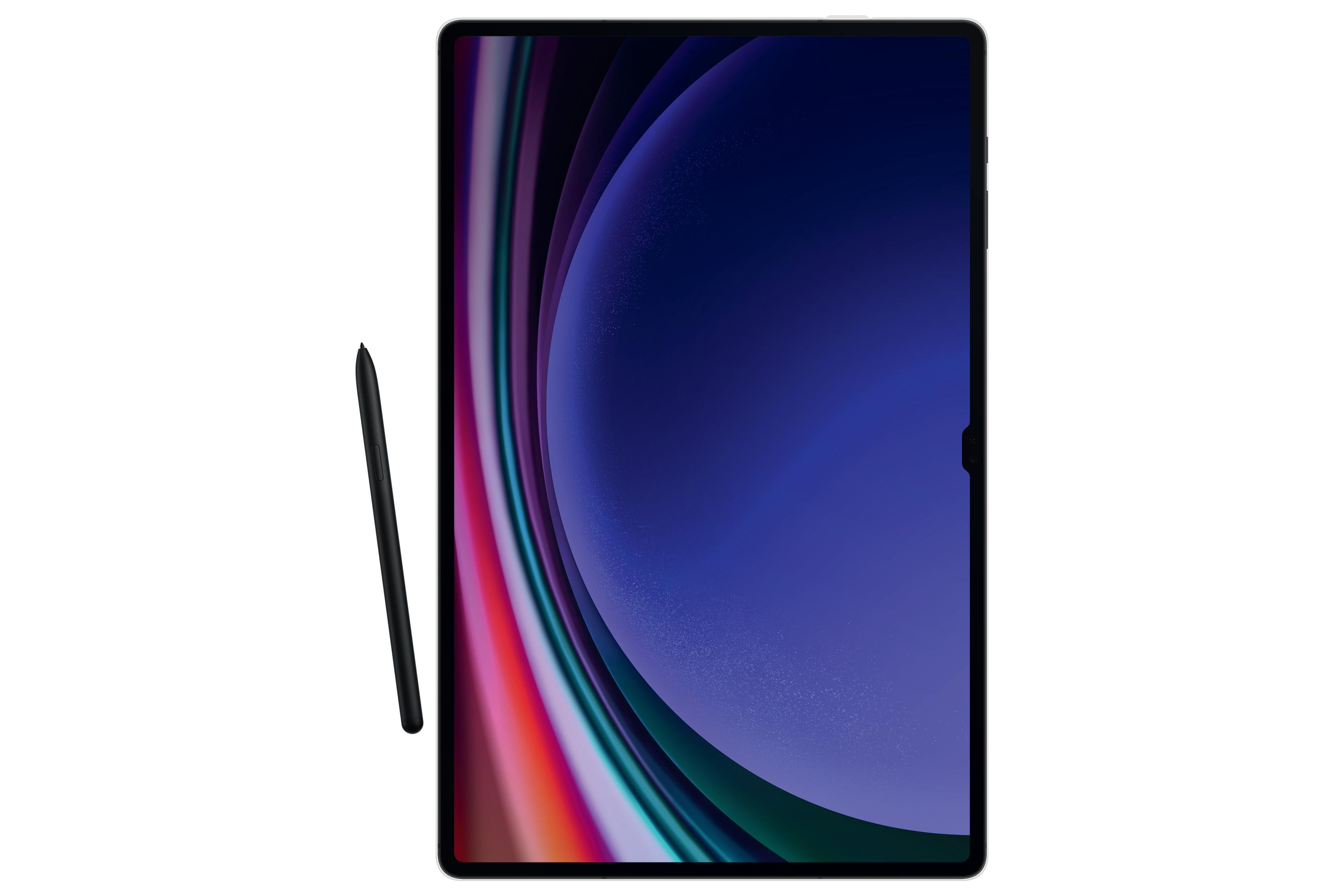Tablet z rysikiem. Ekran wyświetla kolorowy, abstrakcyjny wzór.