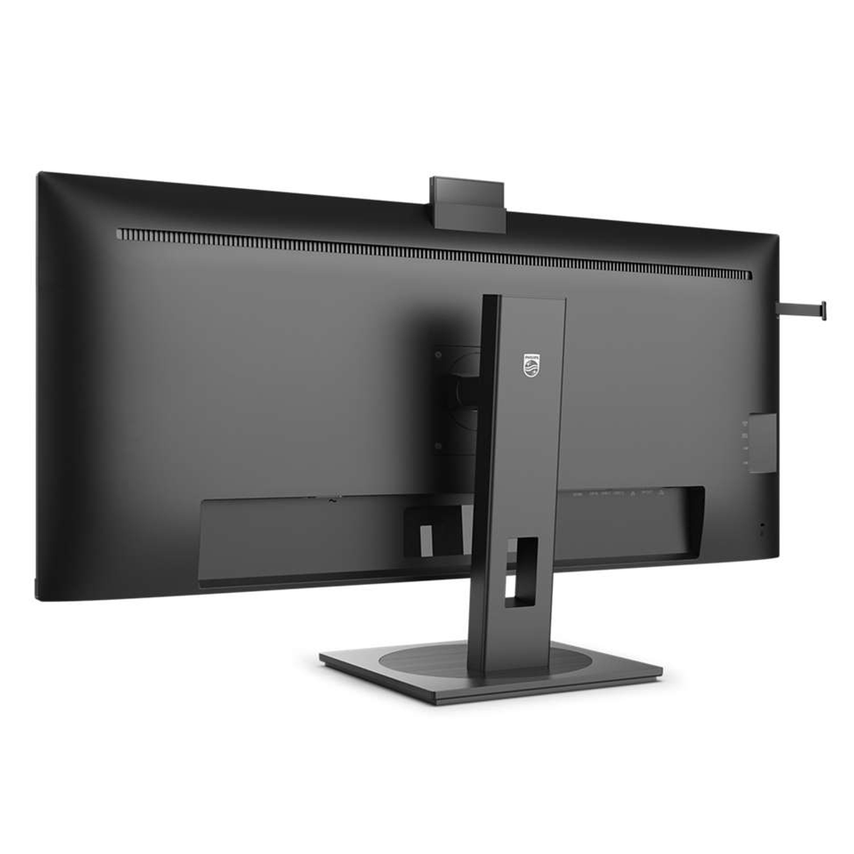 La parte trasera de un monitor negro con soporte y accesorio de cámara web, con el logo de Philips.