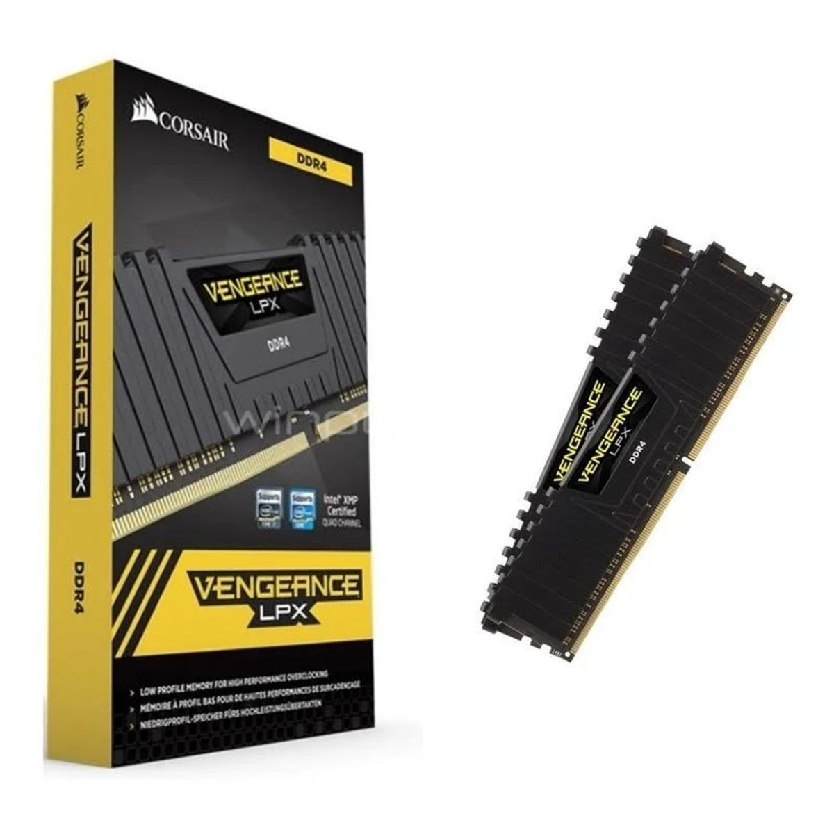 Czarno-żółte pudełko modułów RAM i dwa moduły RAM.