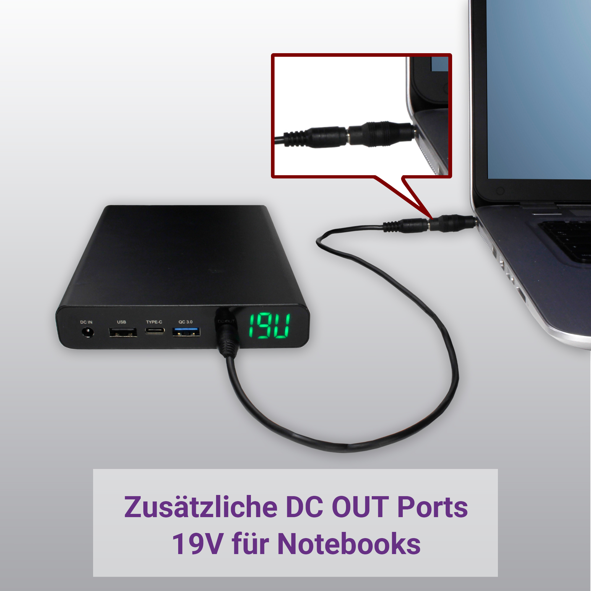 Eine schwarze Powerbank mit Anzeige von 19V, mit Kabel an einem Laptop angeschlossen.