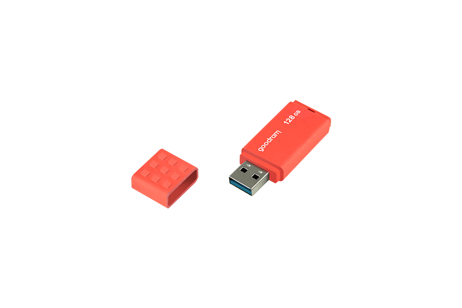 Czerwony dysk flash USB z nasadką. Dysk jest otwarty i leży na białej powierzchni.