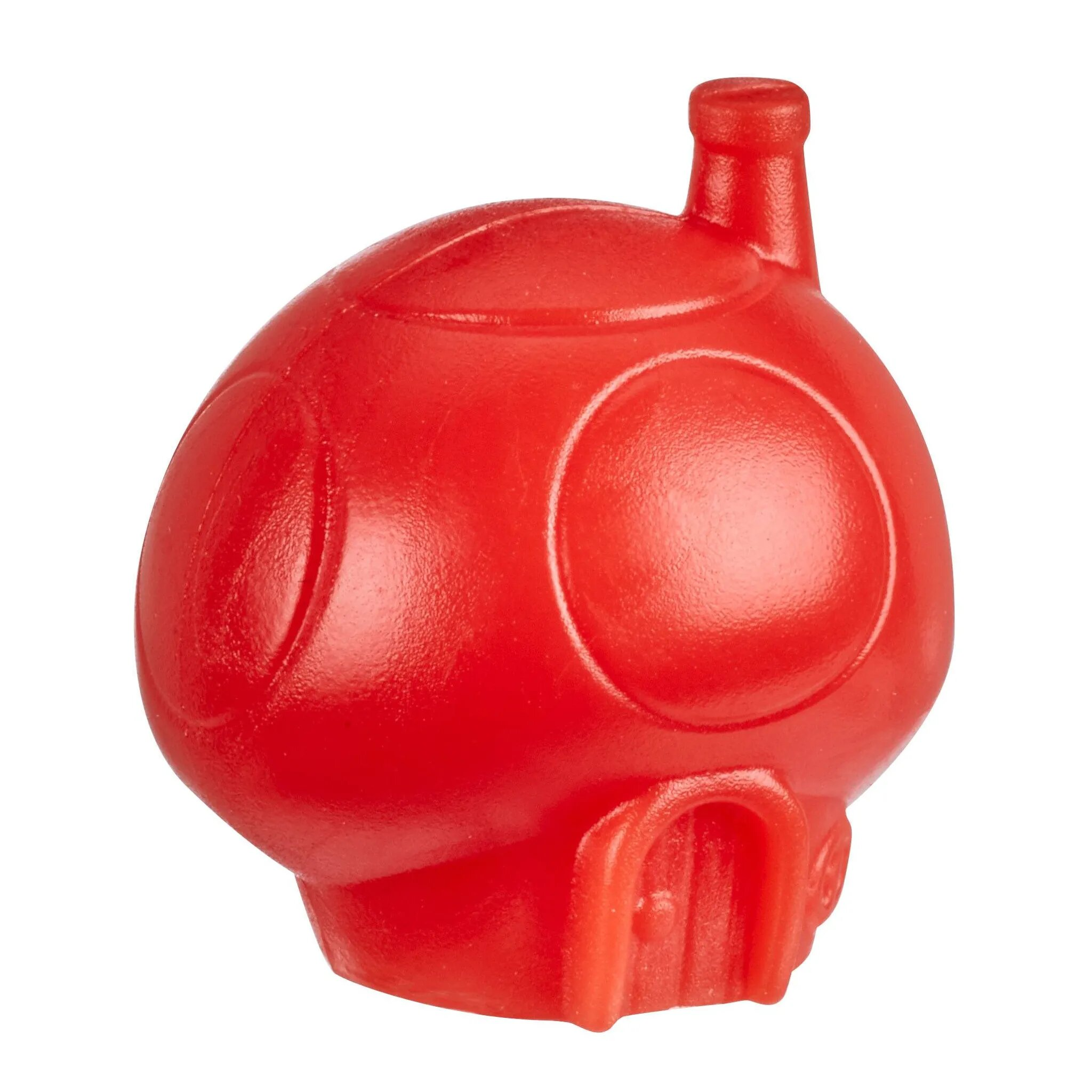 Ein rotes Plastikspielzeug in Form eines Hauses mit Schornstein. Es hat Kreise und eine Tür.