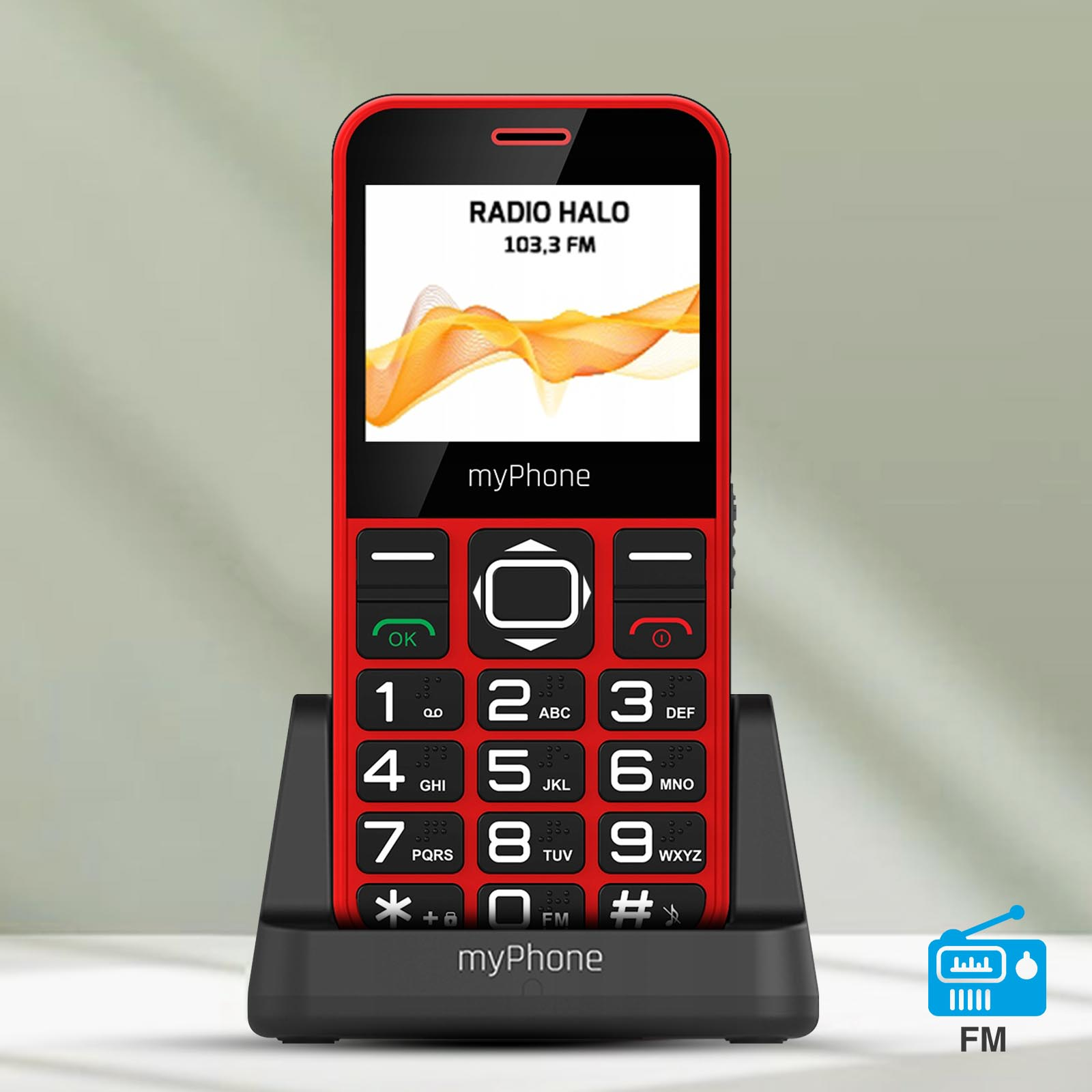 Rotes myPhone mit großen Tasten auf einem Ständer, zeigt einen Radiosender an.
