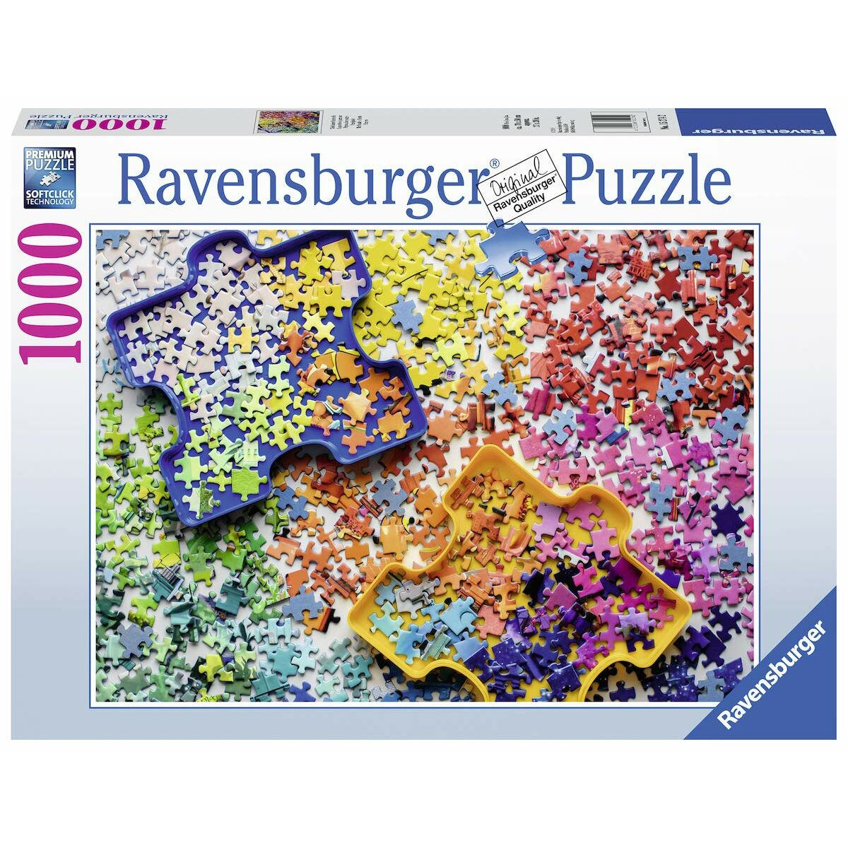 Ein Puzzlekarton mit Schalen voller Teile. Verschiedene Farben und Formen. Marke Ravensburger.