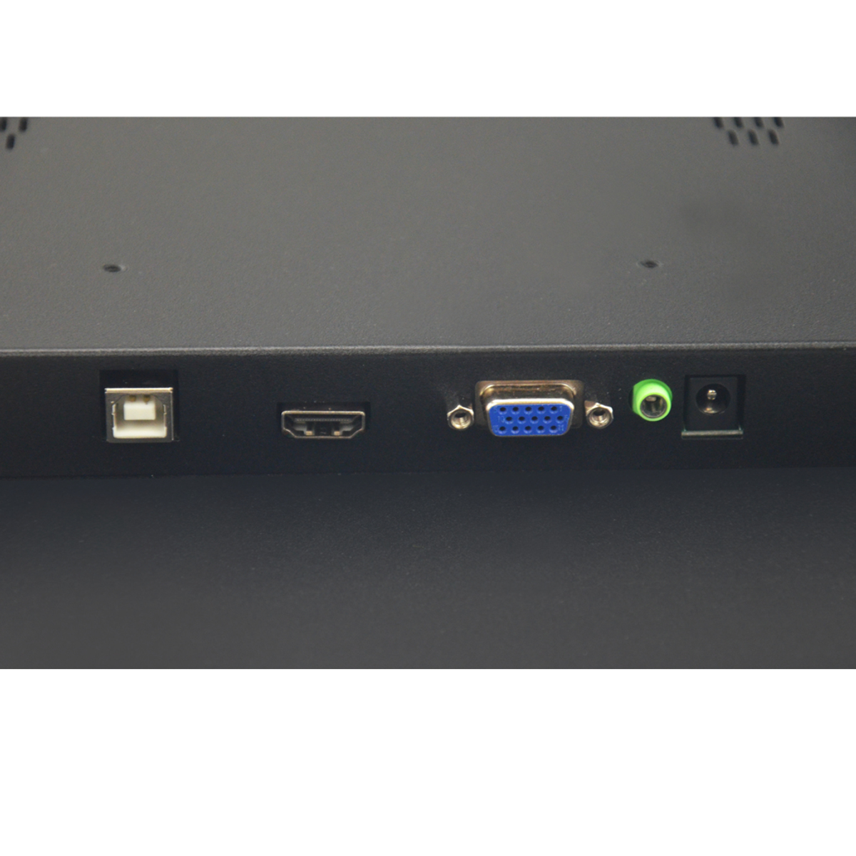 Zbliżenie tylnej części monitora z portami USB, HDMI, VGA i audio.