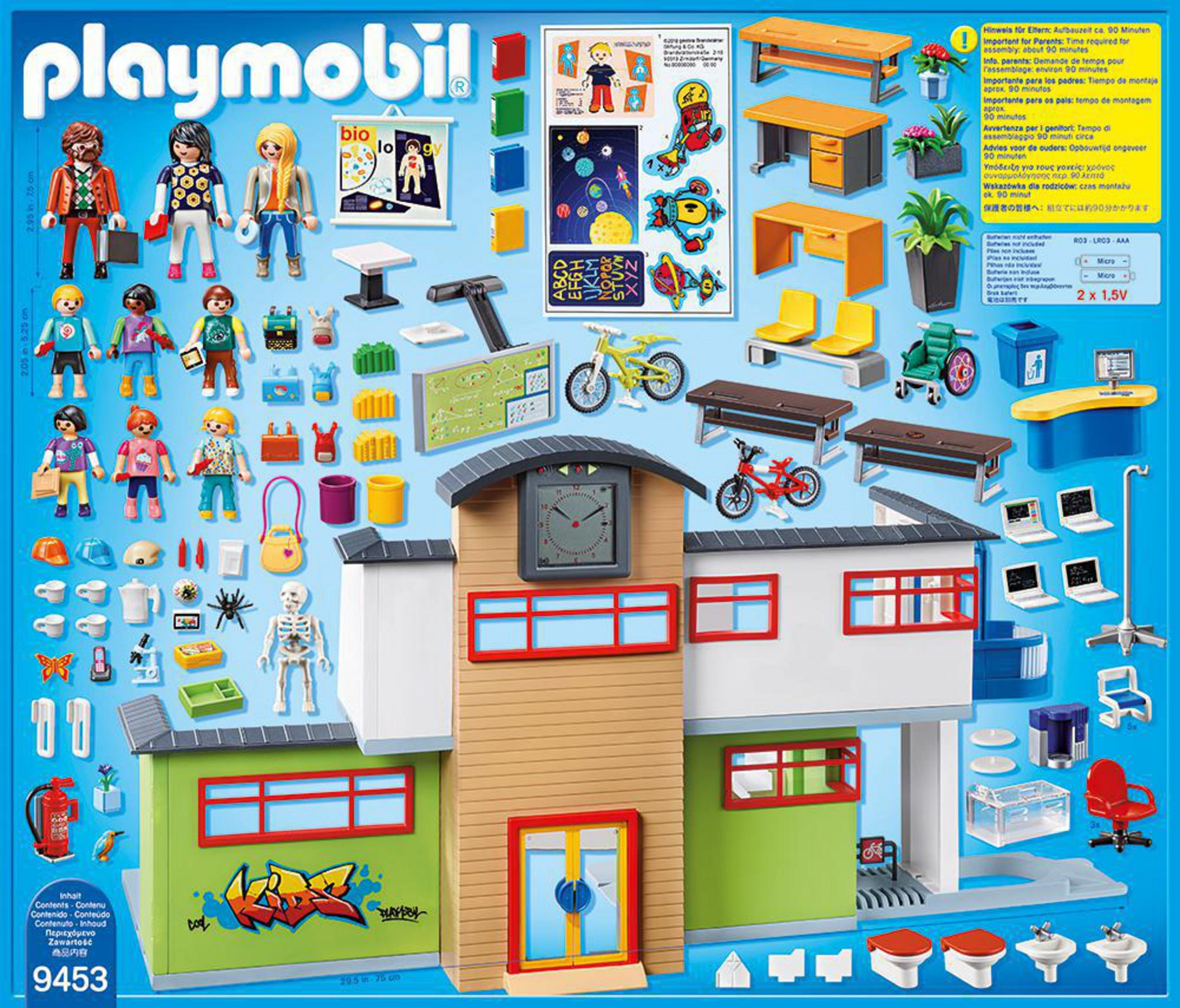 Set Playmobil con personaggi, edificio scolastico e accessori. Scatola colorata, sfondo bianco.