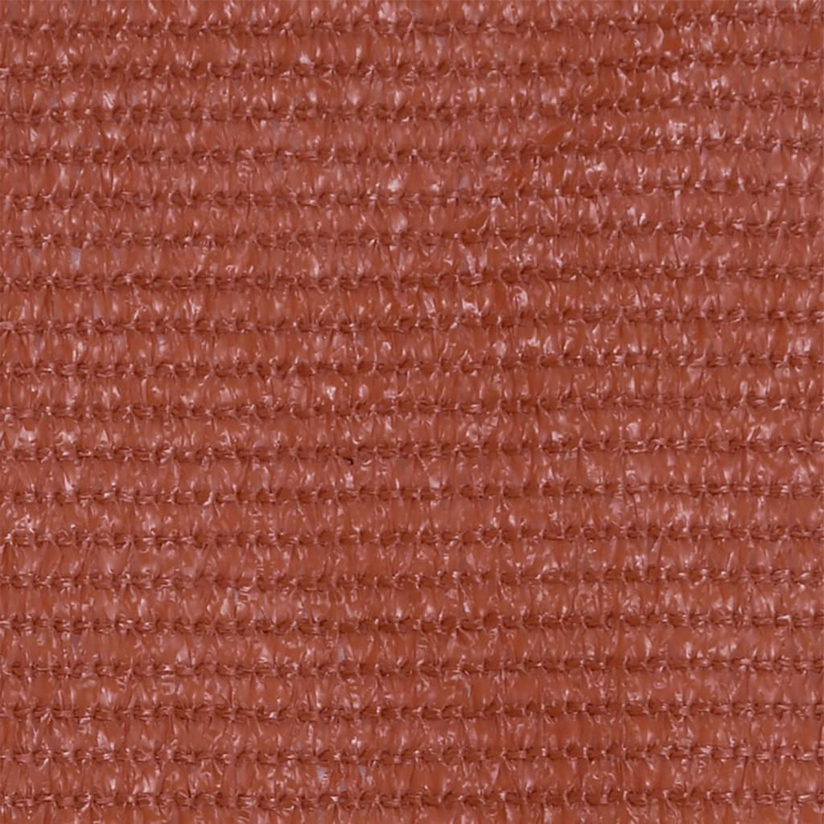 Nahaufnahme eines braunen Gewebes. Die Textur ist mit vielen kleinen, gleichmäßig verteilten Löchern sichtbar.