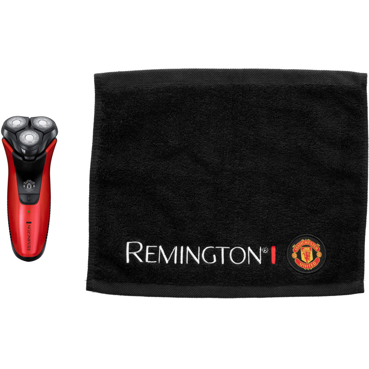 Una afeitadora eléctrica roja y negra junto a una toalla negra con el logotipo de Remington y el de Manchester United.