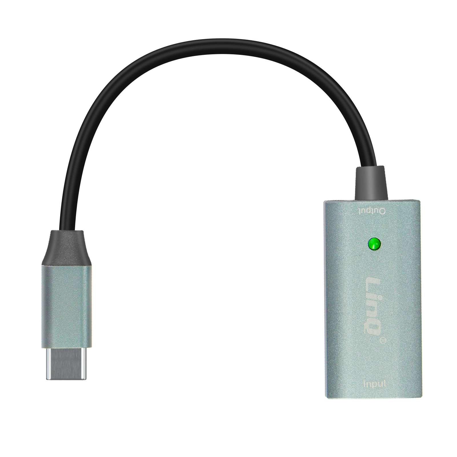 Piccolo adattatore argentato con cavo nero e luce verde, con etichette di ingresso e uscita.