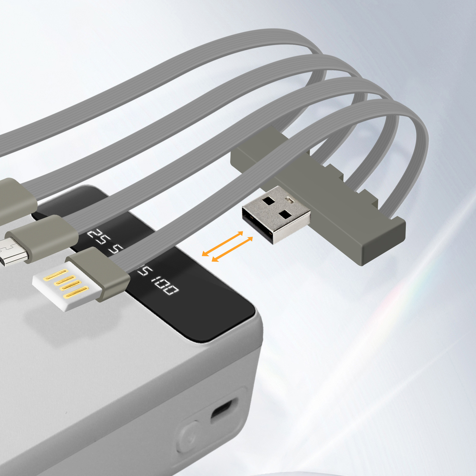 Batterie externe grise avec plusieurs câbles de charge et connecteur USB sur fond clair.