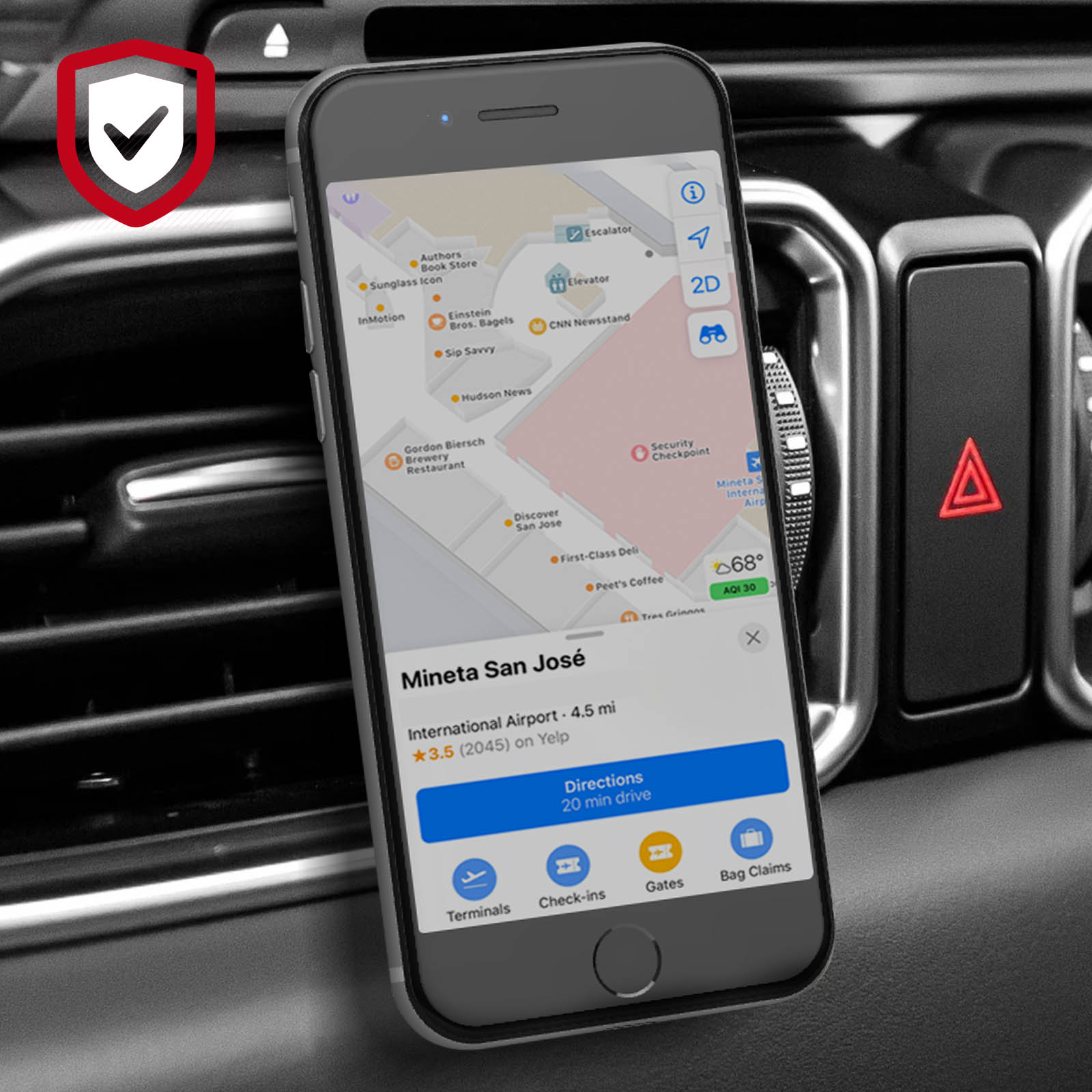 Telefon in Autohalterung mit Karten-App, Innendetails. Schwarzes und silbernes Design.