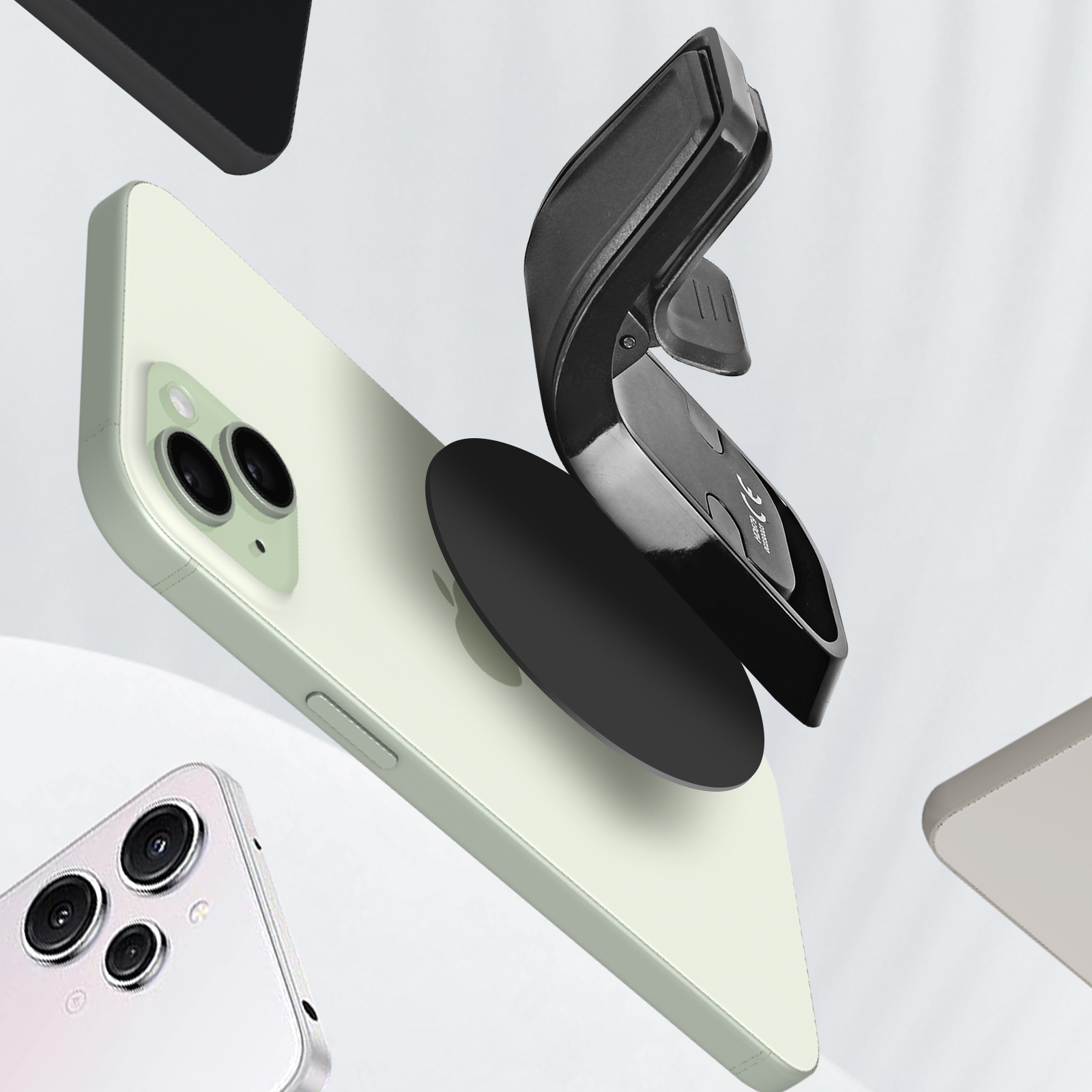 Supporto per telefono nero collegato a un telefono verde chiaro. Diversi telefoni sullo sfondo.