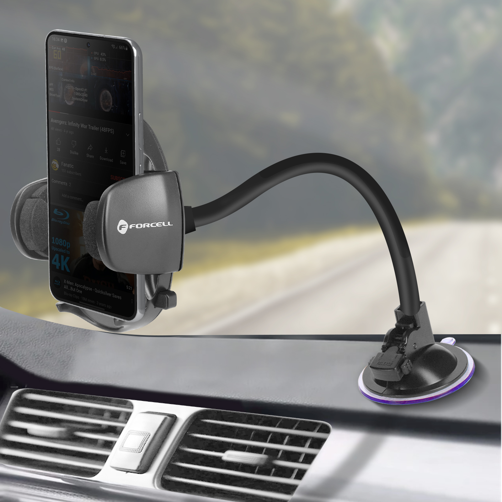Ein Telefon, das mit einem flexiblen Arm und einem Saugnapf am Armaturenbrett eines Autos befestigt ist. Das Telefon zeigt ein Video.
