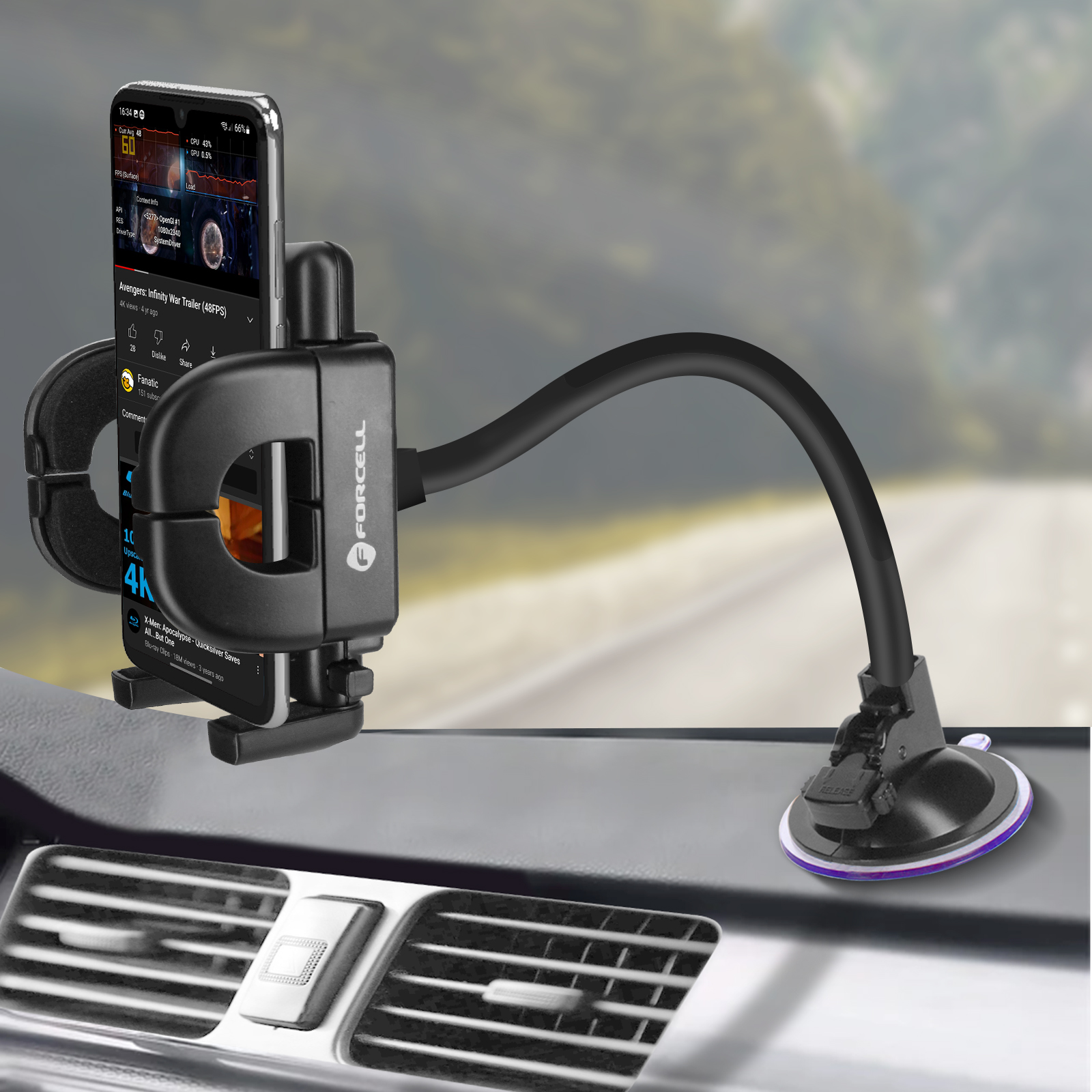Autoinnenraum mit Handyhalter, Video und Lüftung.