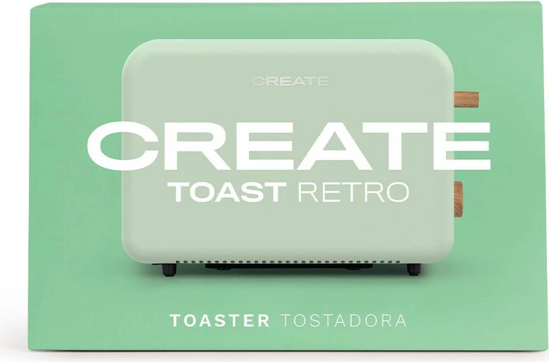 Una tostadora verde menta en una caja, con la palabra CREATE en blanco.