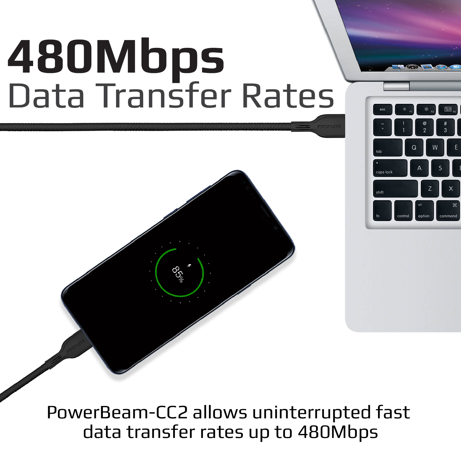 Cable negro conectando teléfono a portátil. Texto de transferencia de datos arriba. 85% batería.