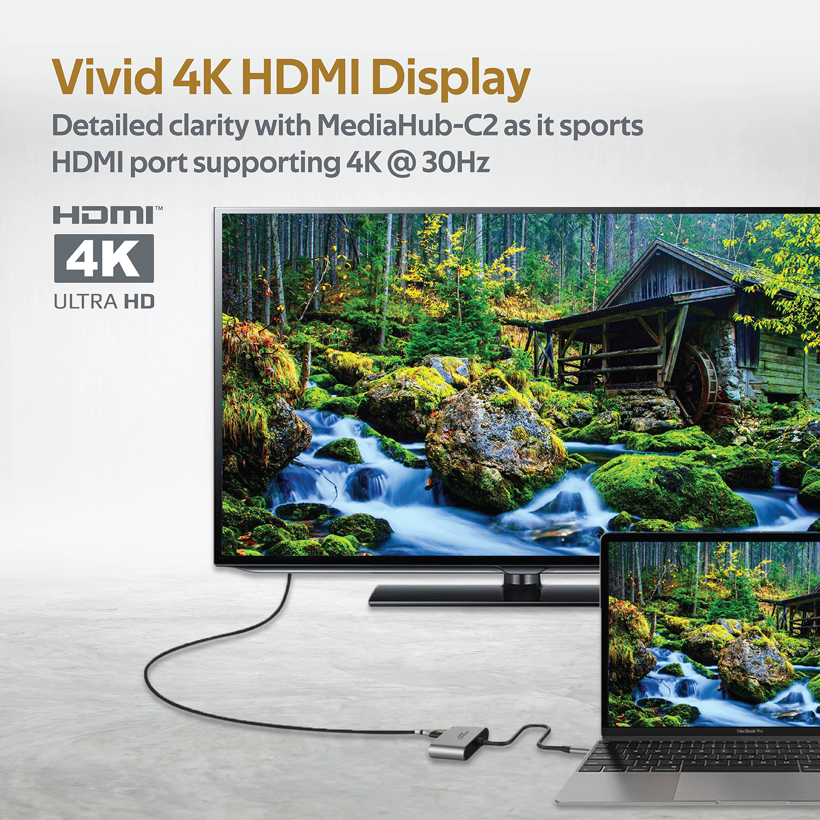 Un monitor que muestra una imagen 4K con una computadora portátil conectada.