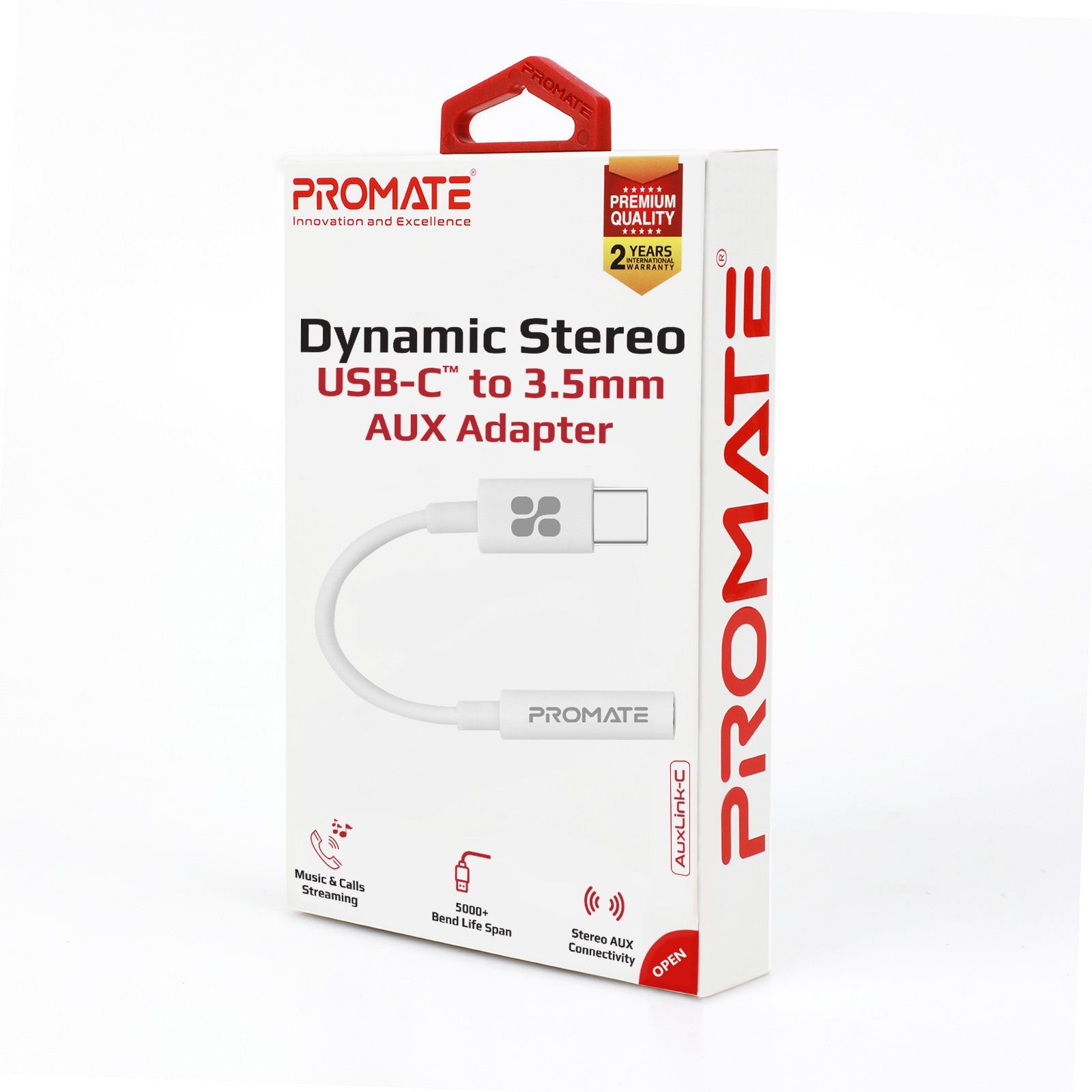 Caja de adaptador blanca con un adaptador USB-C a AUX de 3,5 mm. Texto: 'Dynamic Stereo AUX Adapter'.