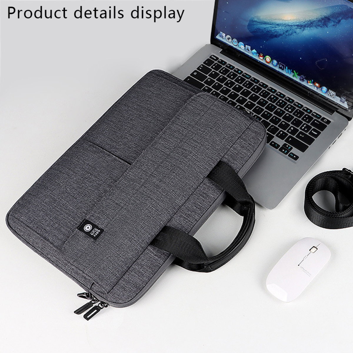 Laptoptasche mit Griffen, ein Laptop, eine weiße Maus und eine Handschlaufe.