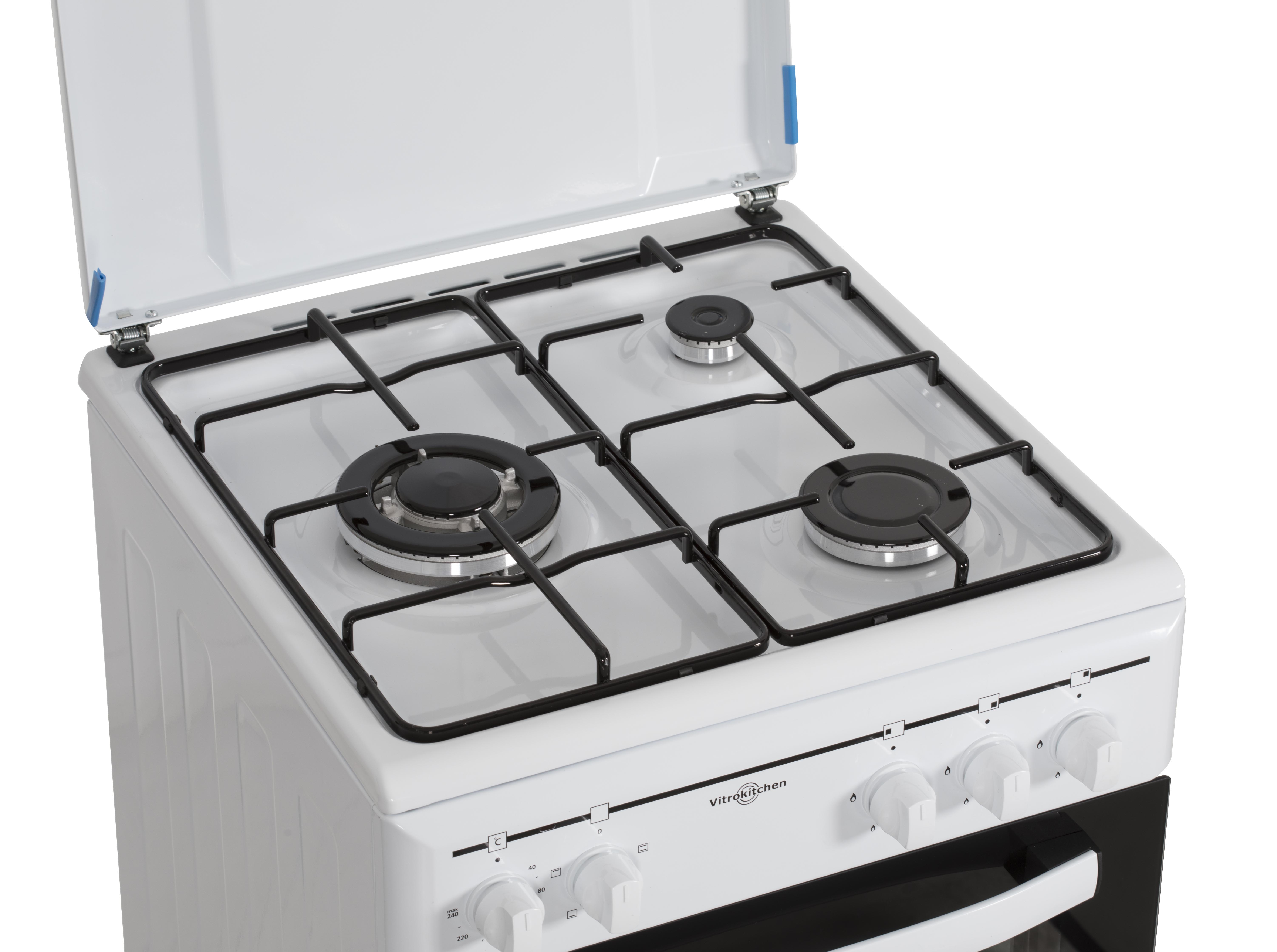 Primer plano de una cocina de gas blanca con cuatro quemadores, rejillas negras y tapa transparente. Perillas abajo.