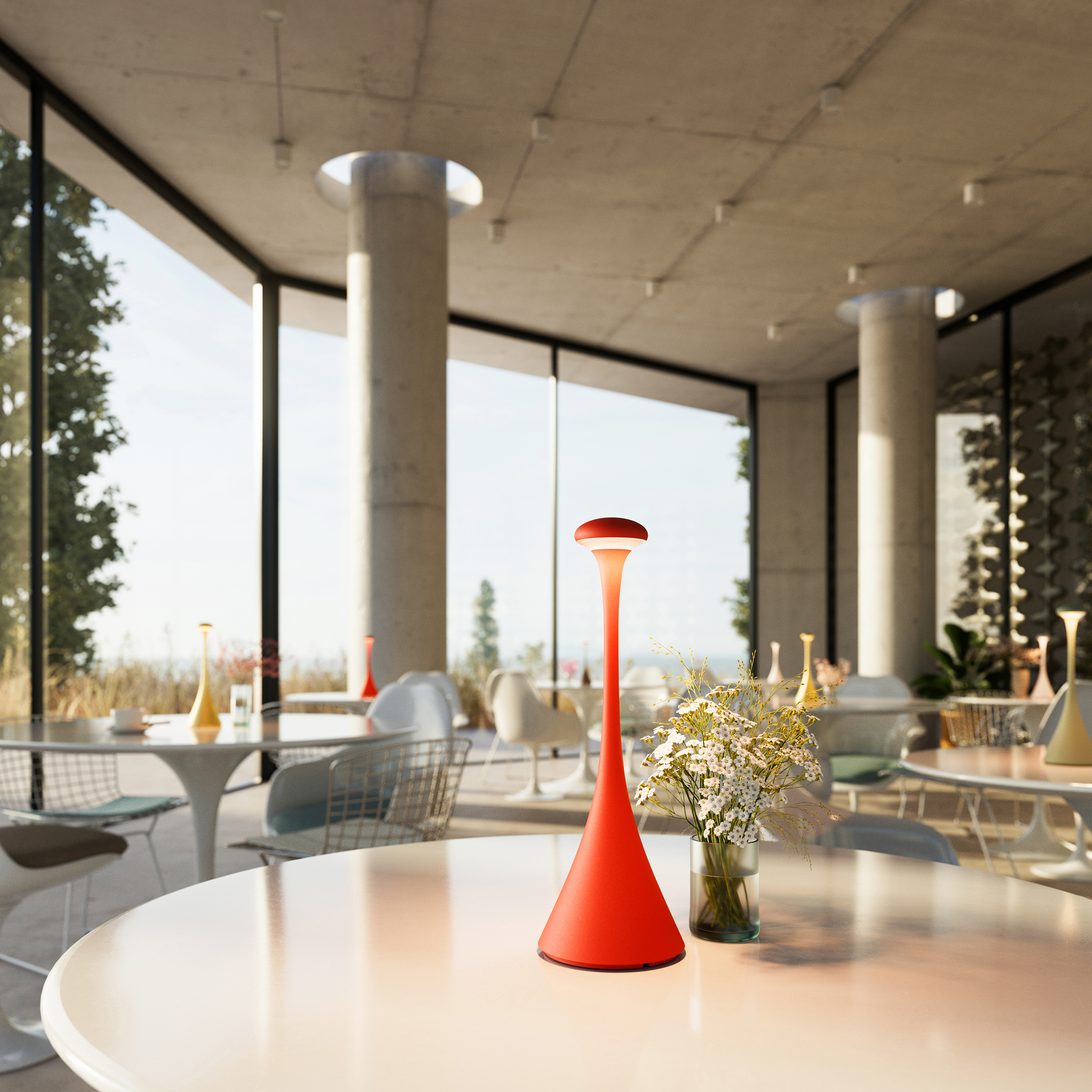 Eine rote Lampe auf einem Tisch in einem modernen Raum.
