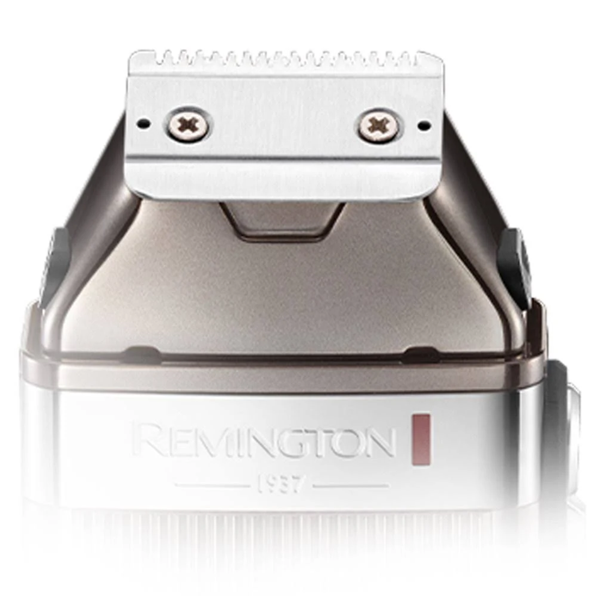 Nahaufnahme eines Remington-Rasiererkopfes mit zwei Schrauben und dem Text 'Remington 1937'.