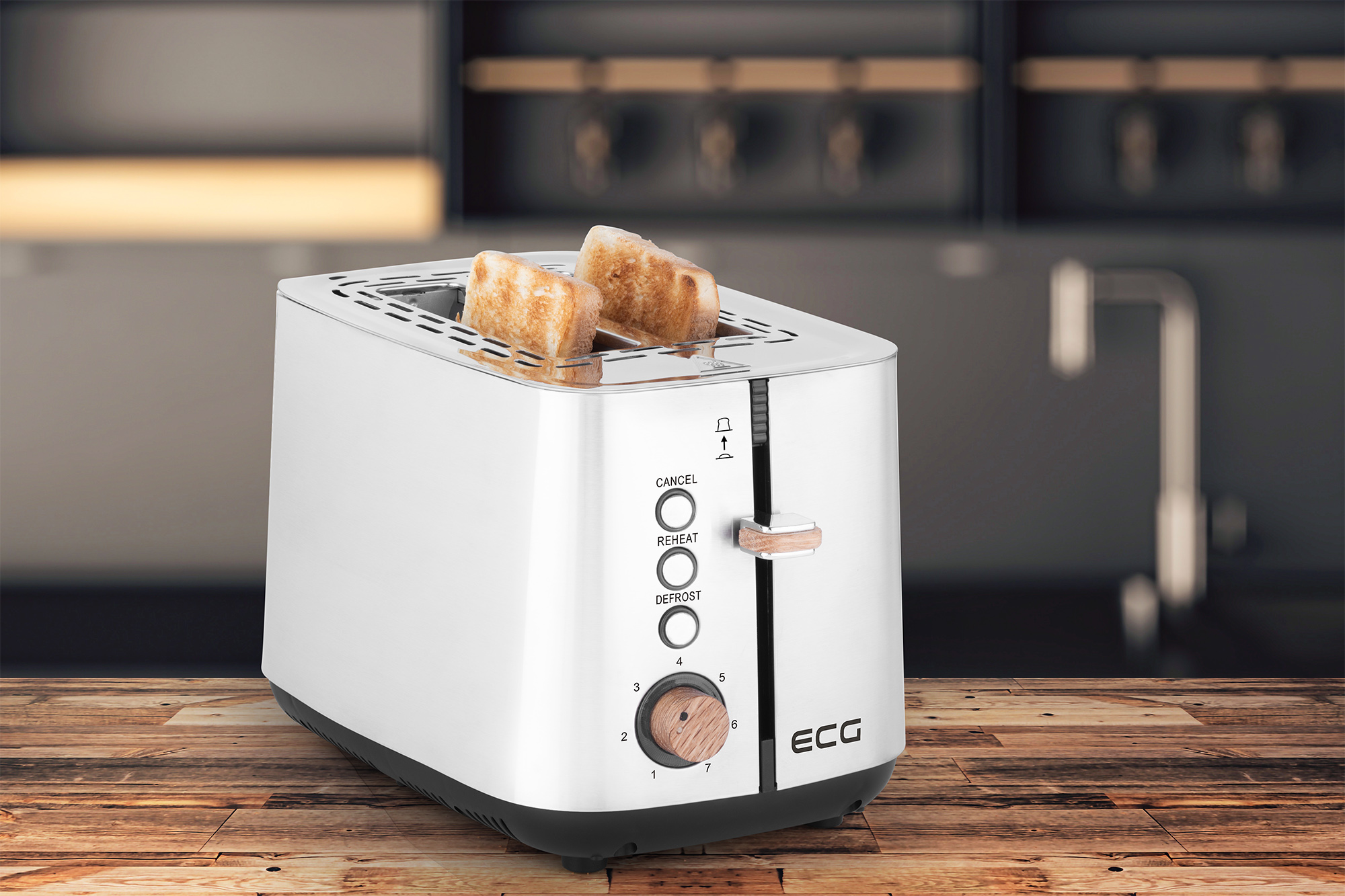 Ein silberner und weißer Toaster mit zwei Toastscheiben darin.