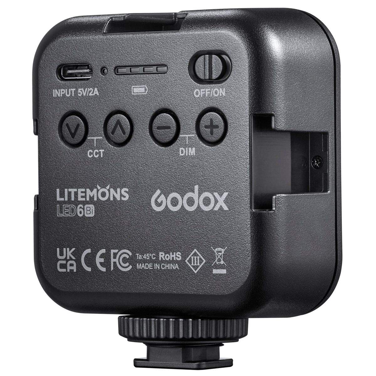 Schwarzes Godox LED-Licht mit Knöpfen, Eingängen und Ausgängen, schwarzer Hintergrund.