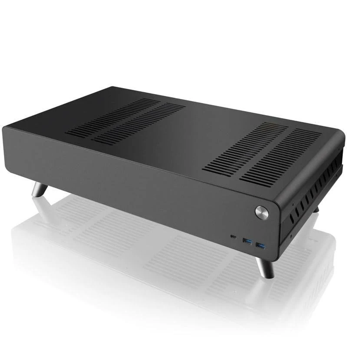 Schwarzes Computergehäuse, rechteckig, silberne Beine, flache Oberseite.