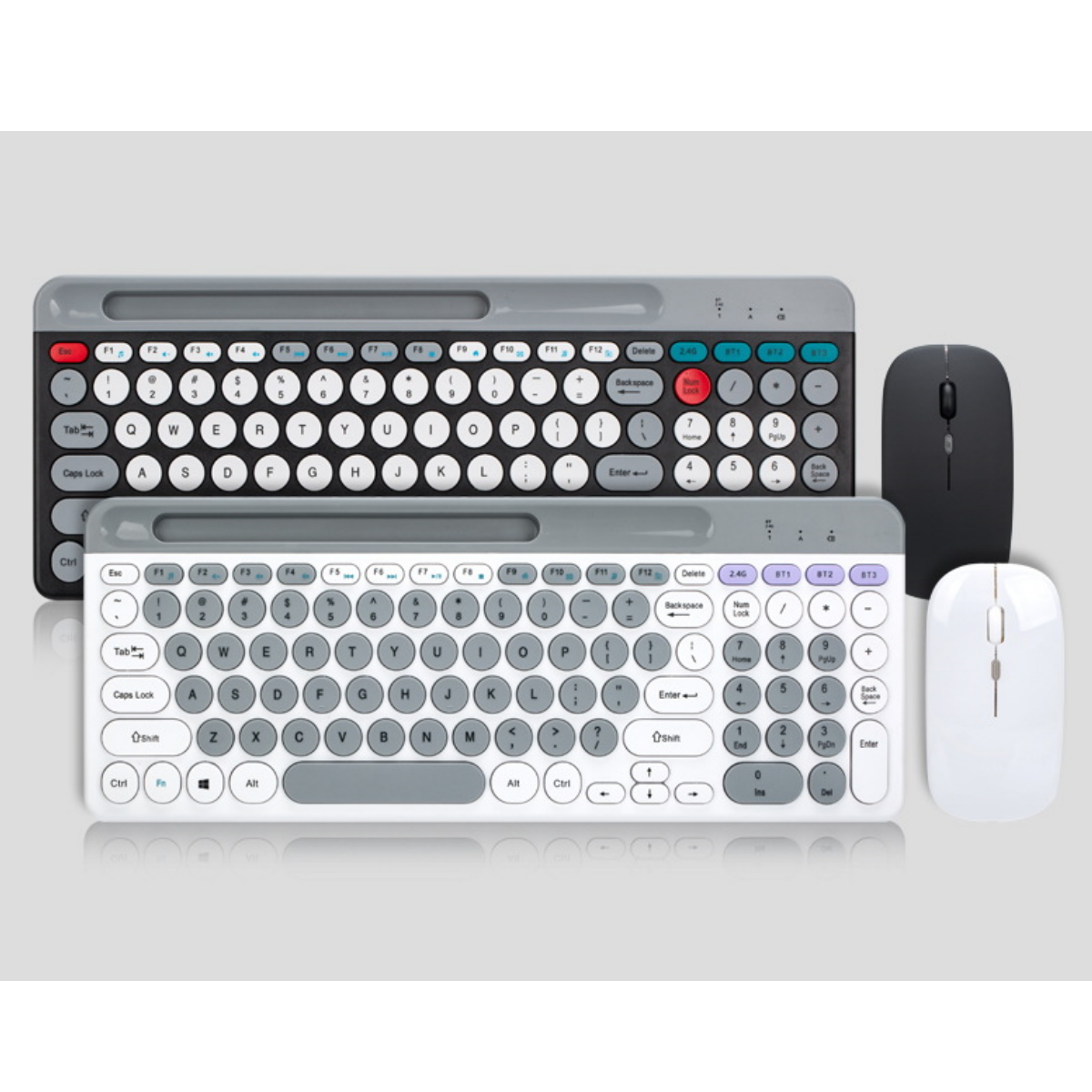 Dos teclados inalámbricos y dos ratones, uno gris y otro blanco, sobre una superficie blanca.