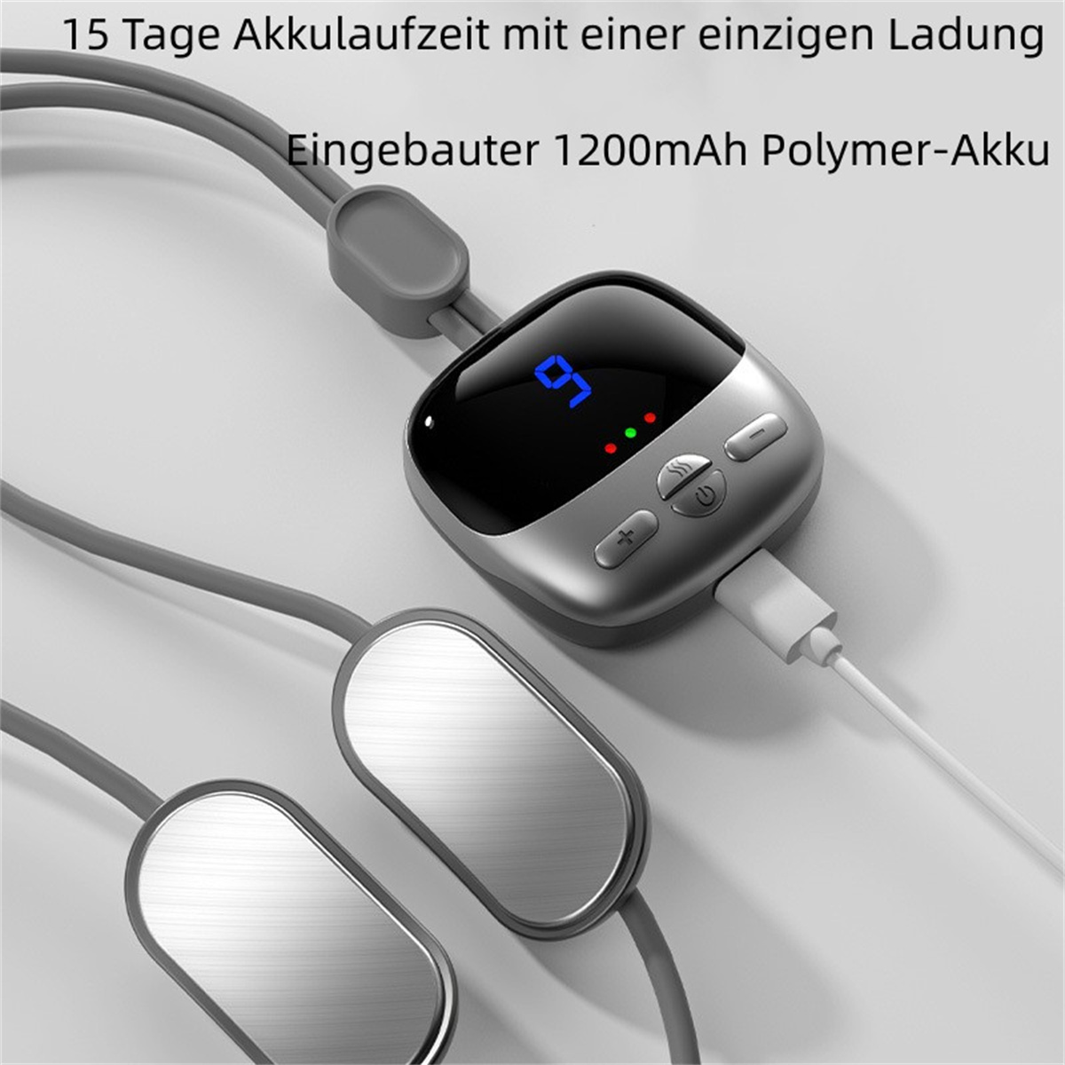 Dispositivo gris con pantalla y dos almohadillas plateadas conectadas por cables grises.