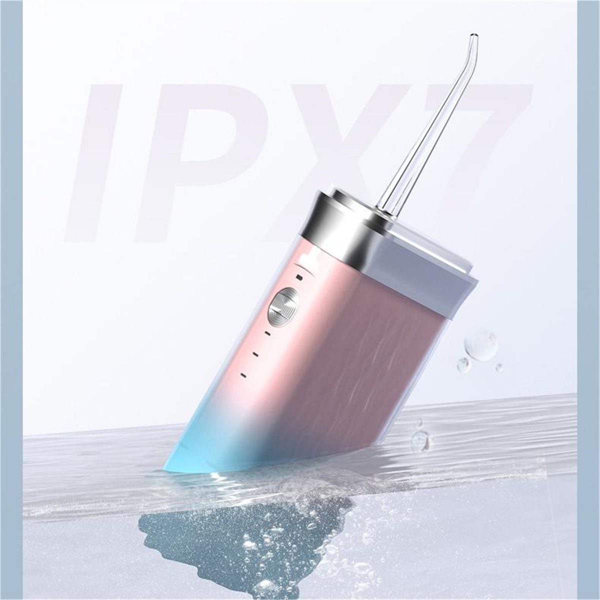 Irrigador dental rosa y plateado con boquilla larga y delgada, con gotas de agua y texto IPX7.