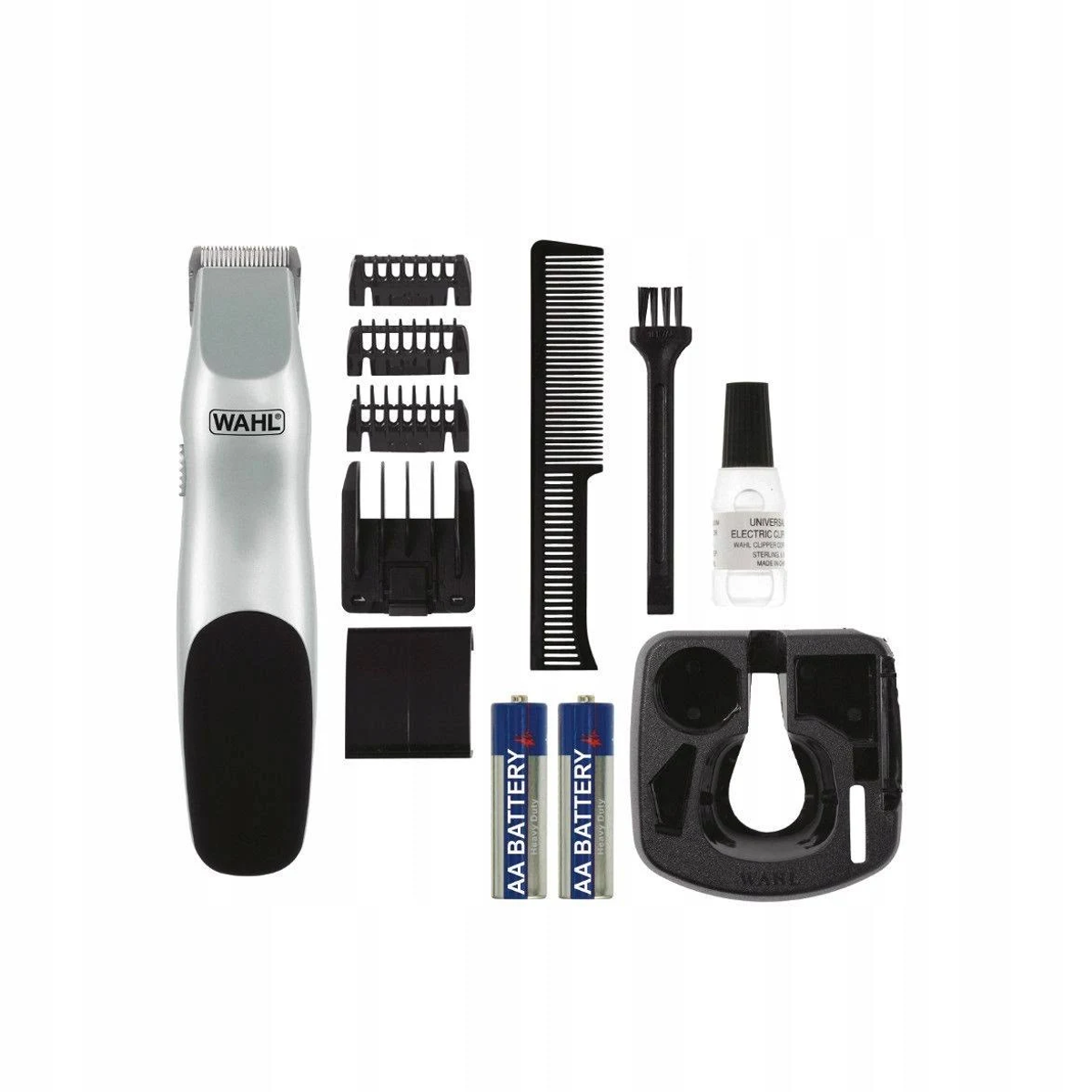 Un kit per la toelettatura con trimmer, protezioni, pettine, olio, batterie e caricatore.