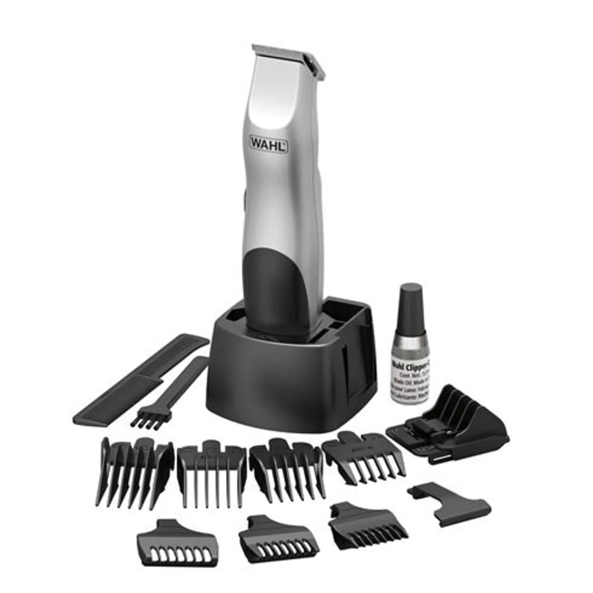 Tosatrice Wahl argento e nera con accessori su superficie bianca.