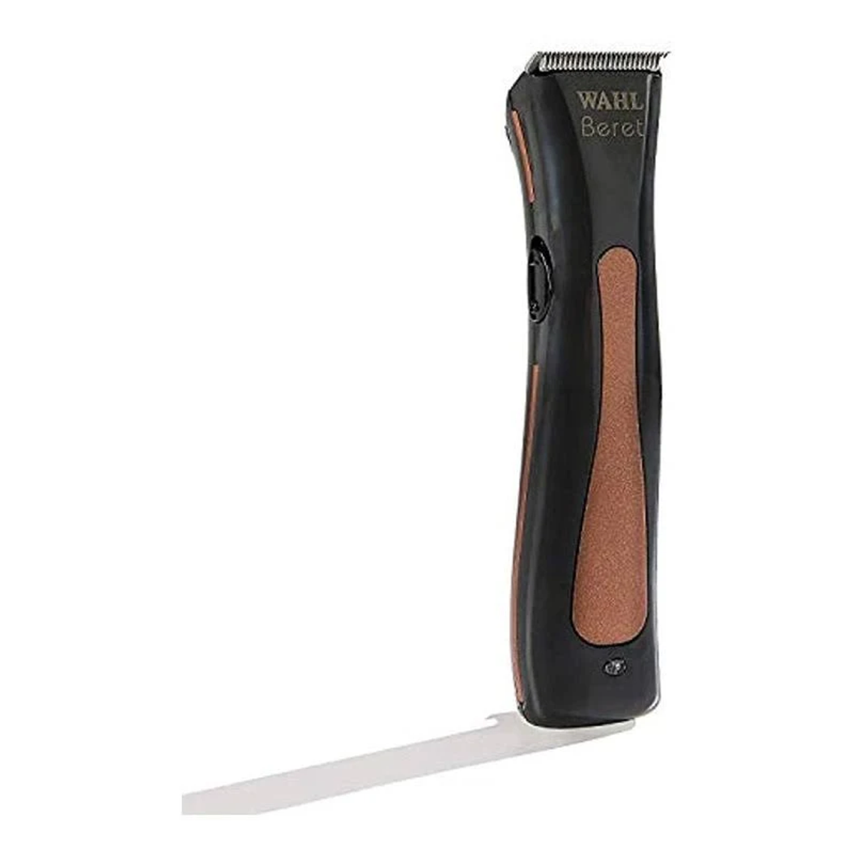 Cortadora de cabello eléctrica negra y marrón. La marca es Wahl Beret.