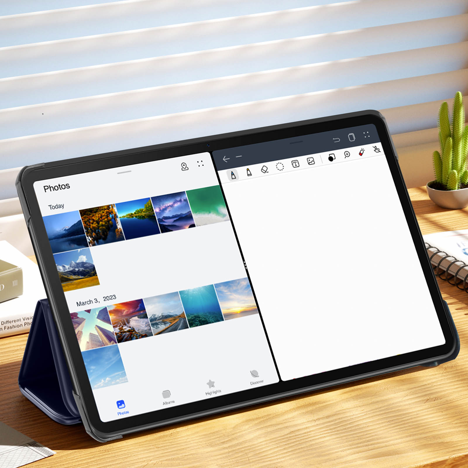 Tablet che mostra una galleria fotografica e un'app per prendere appunti, su un tavolo di legno.