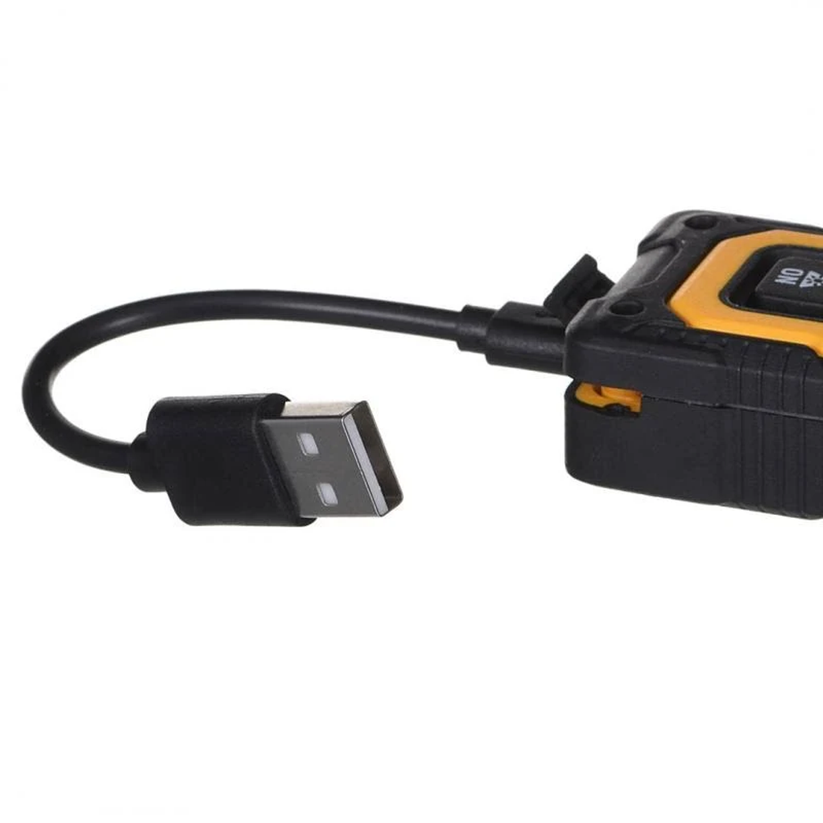 Un cable USB negro está conectado a un dispositivo de medición amarillo y negro.