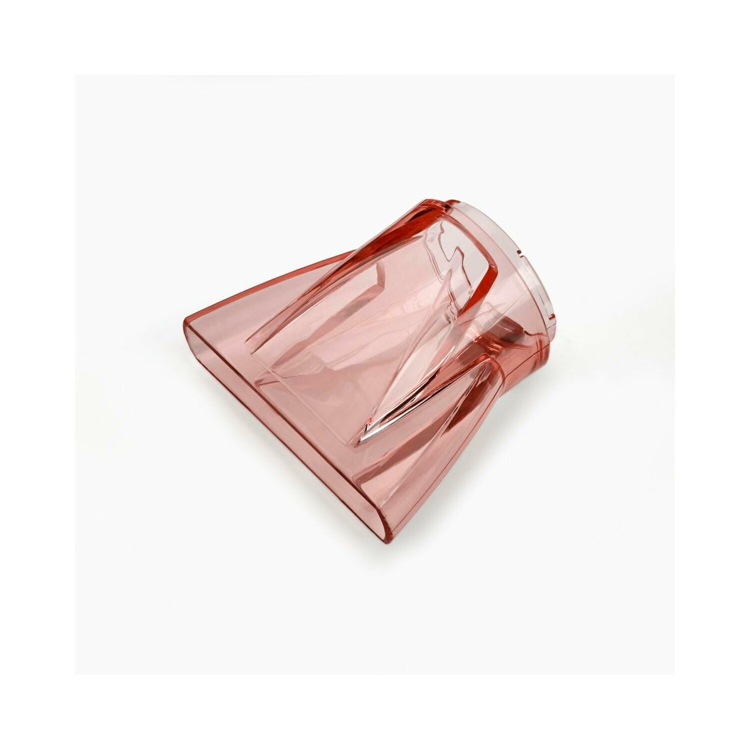 Czerwona plastikowa dysza na białym tle. Wygląda na nasadkę do odkurzacza.