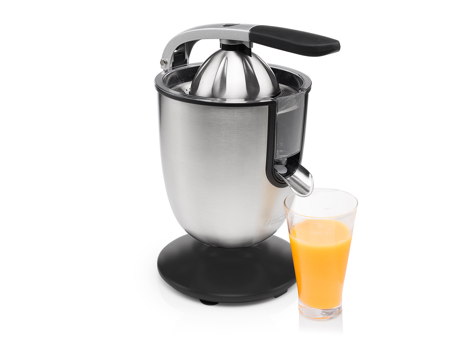 Wyiskarka ze stali nierdzewnej ze szklanką soku pomarańczowego obok.