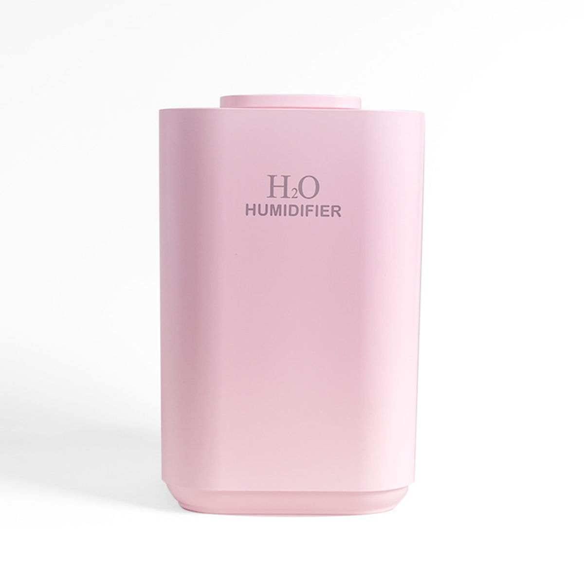 Rosa Luftbefeuchter mit Text 'H2O HUMIDIFIER', weißer Hintergrund, kleine, zylindrische Form.
