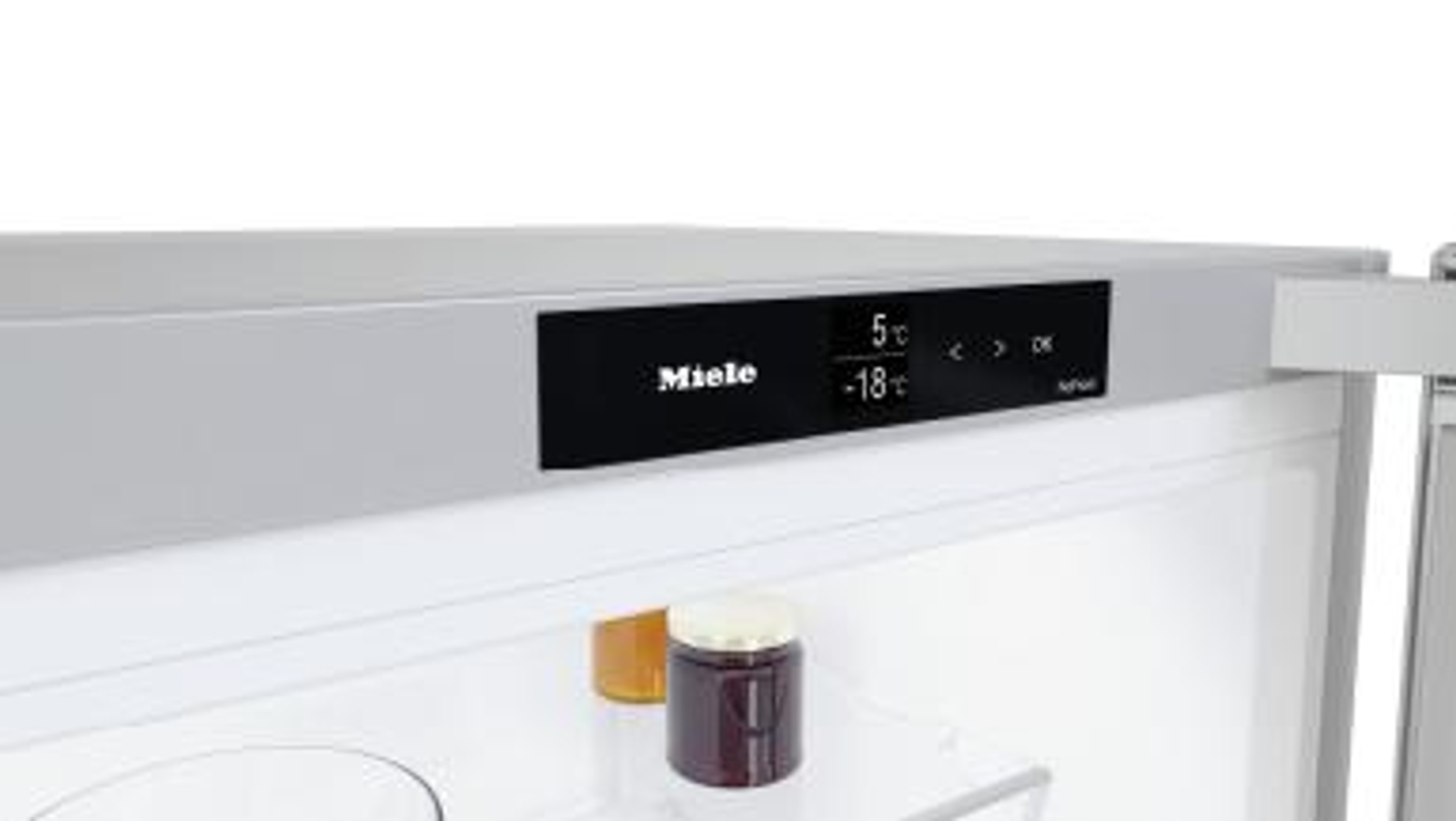Display frigorifero con Miele, 5°C, -18°C e OK. Barattoli all'interno.