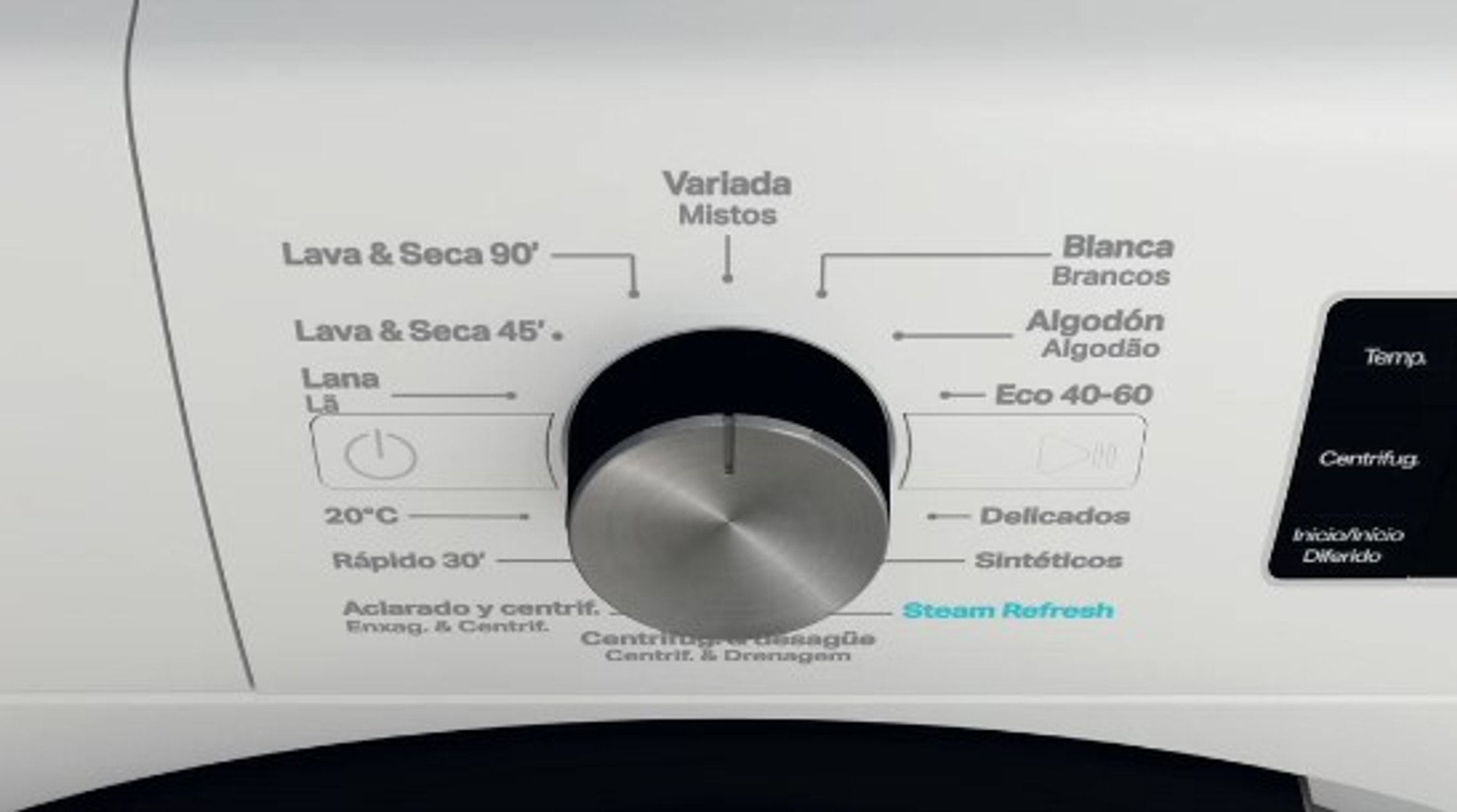 Primer plano del panel de control de una lavadora blanca con varias opciones de ciclo de lavado.