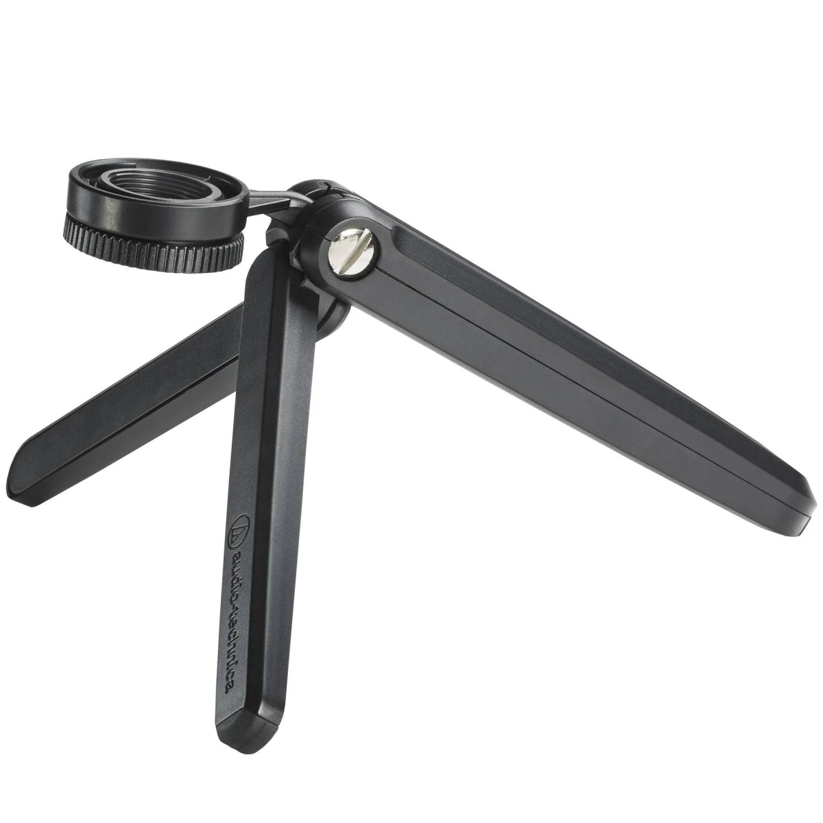 Mały czarny statyw do mikrofonu. Trzy nogi rozłożone, z punktem mocowania mikrofonu.