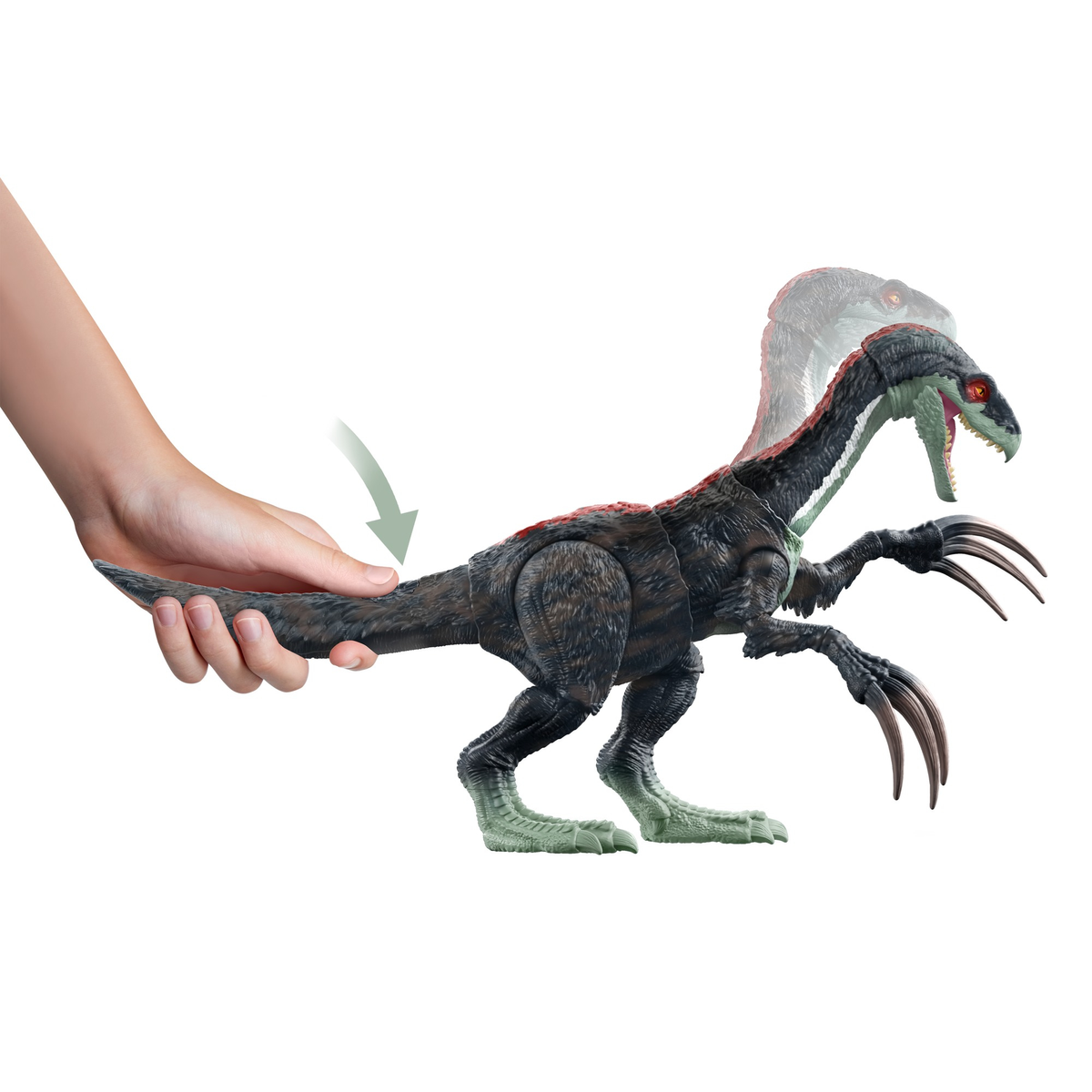 Mano che muove giocattolo dinosauro, primo piano.